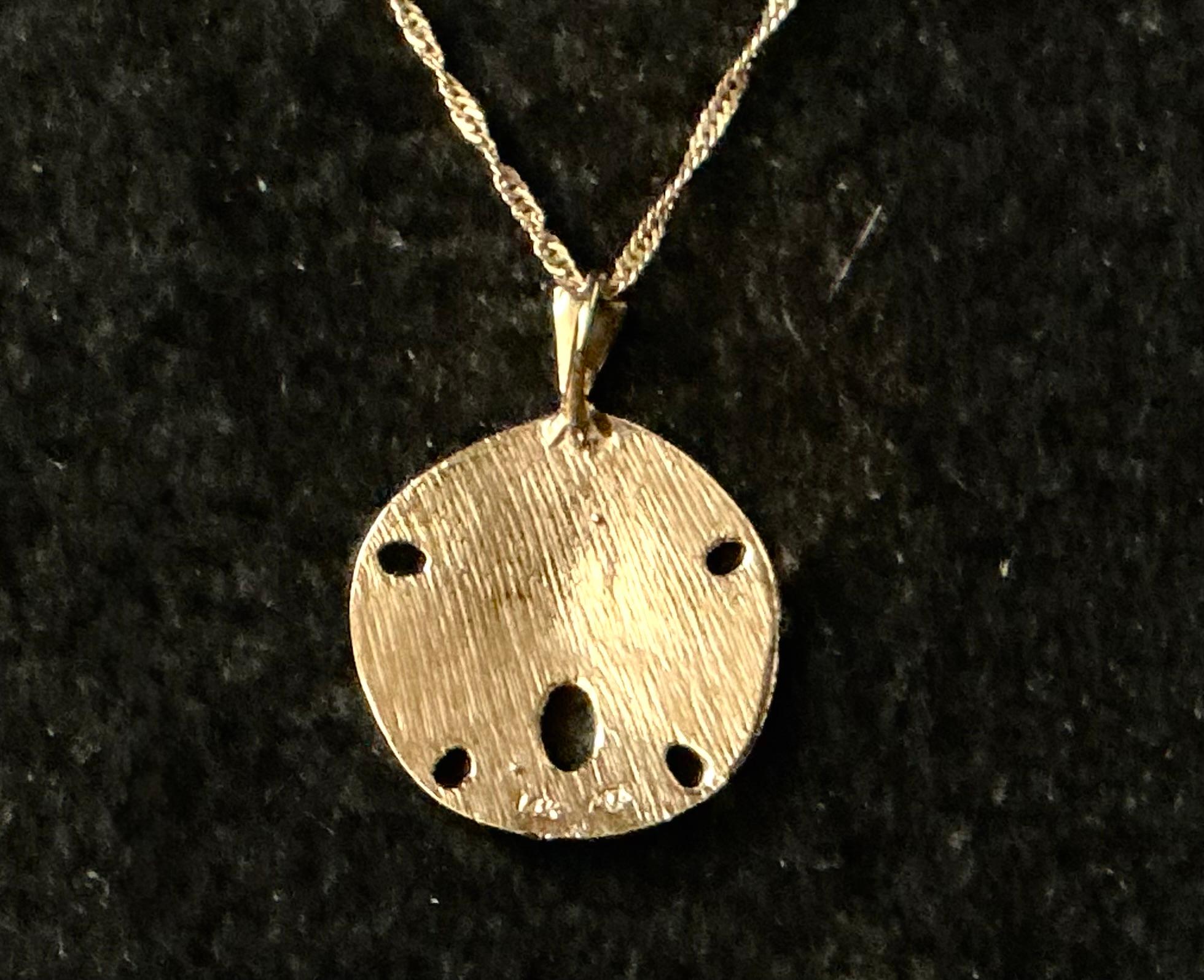 Modern 14K Gold Sand Dollar Pendant For Sale