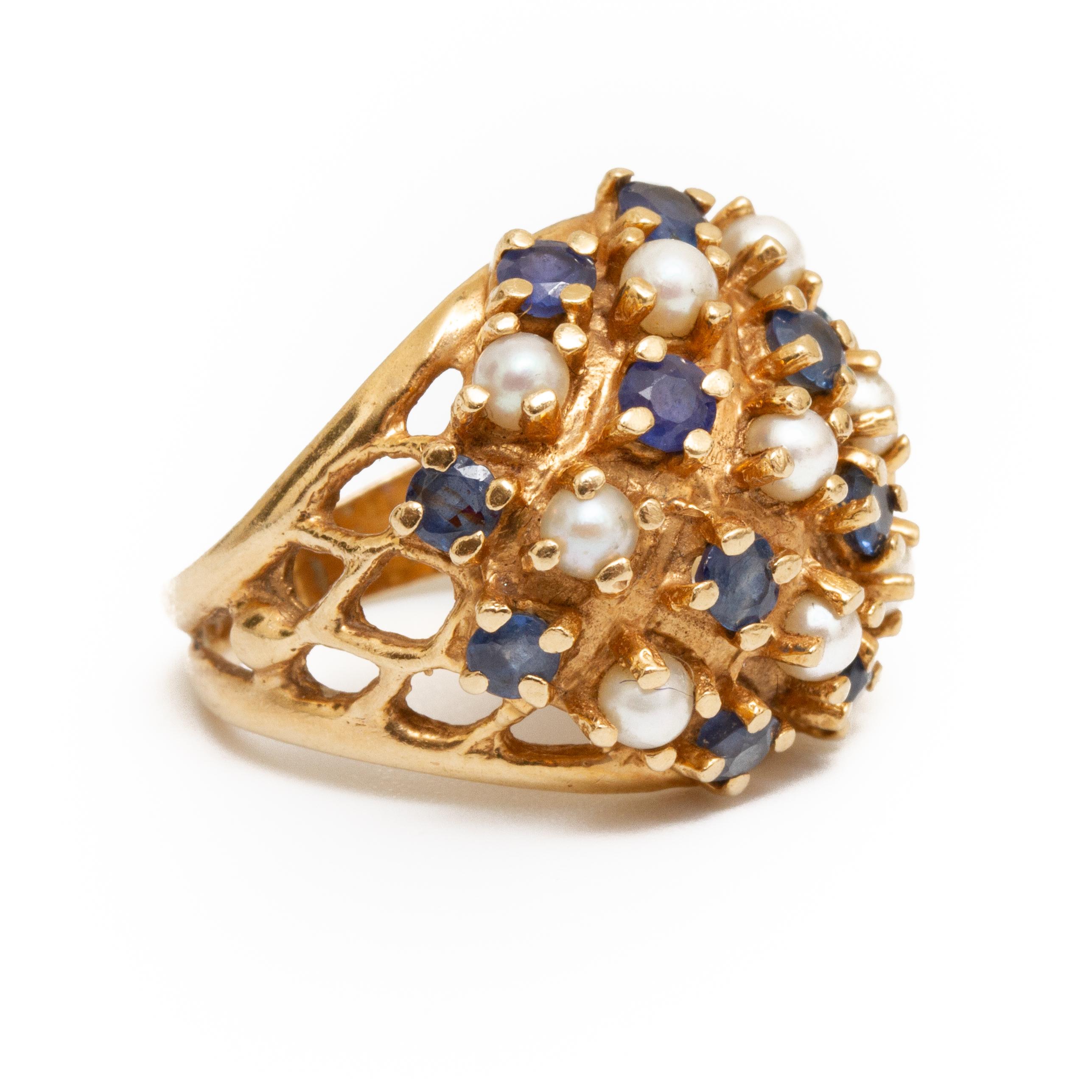 14k gold ring mounted with sapphires and seed pearls size 5.25. Weight approx. 4.8 dwt. From the Broussard estate noted jewelry collection Park Avenue New York