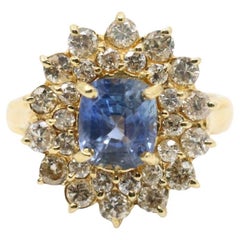 Anillo de oro de 14 quilates con diamantes y zafiros