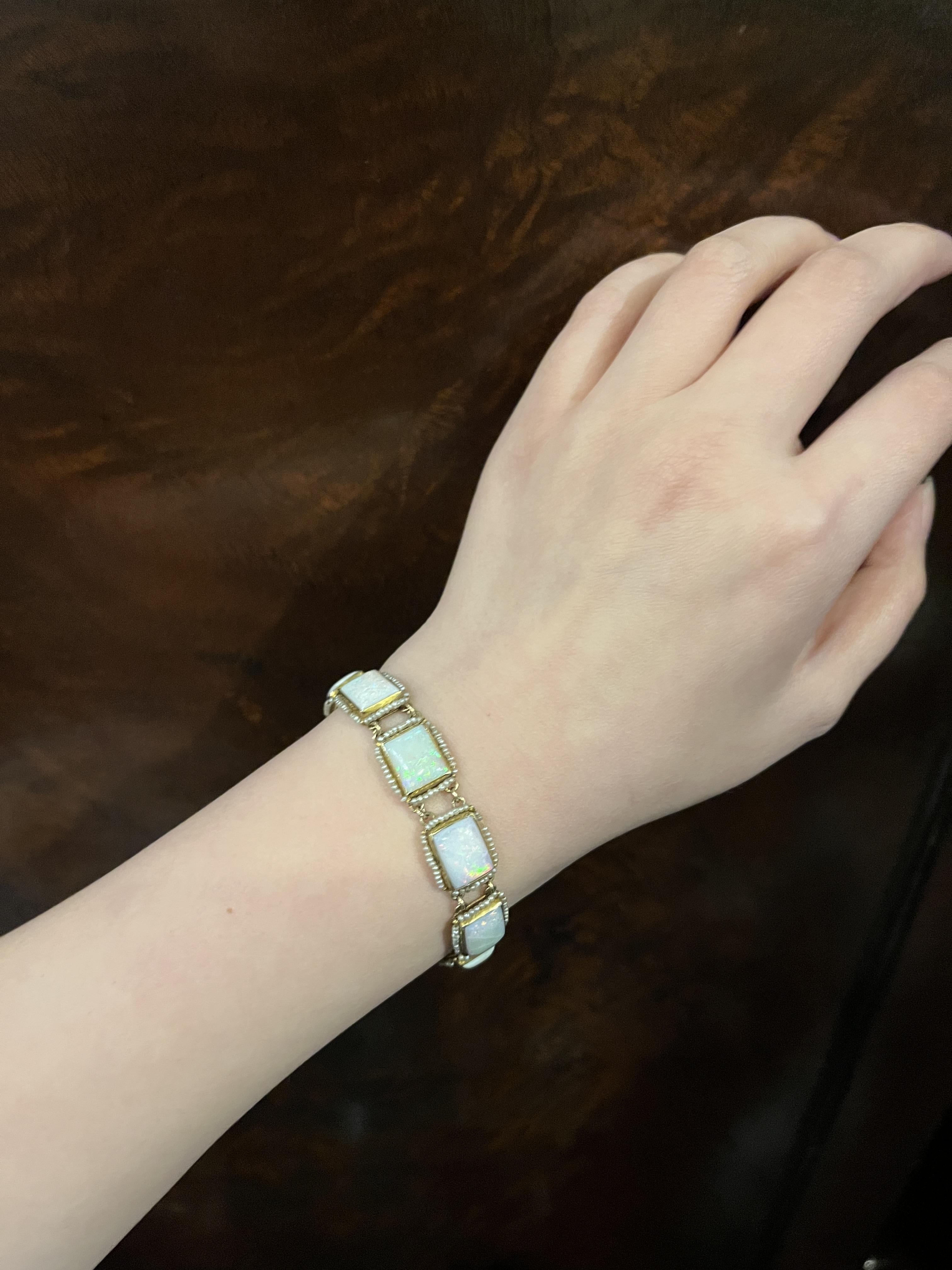 14K Gold Seed Pearl Opal Bracelet

Marked:
14K

Approximate Dimensions:
17 cm (Length)
1.1 cm (Width)
10.64 mm x 8.33 mm - 9.61 mm x 7.99 mm (Opal)
17.7 grams in weight