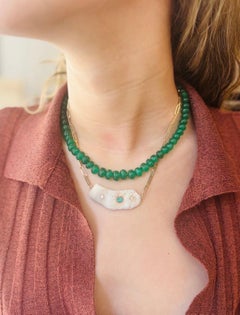 14k Gold Shell Necklace with Emerald and Diamonds