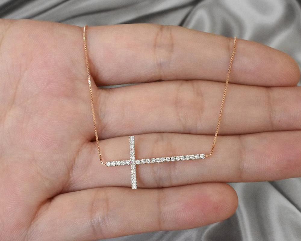 Sideway Diamond Cross Necklace is made of 14k solid gold.
Avaiable in three colors of gold: Rose Gold / White Gold / Yellow Gold.

Cross Necklace showcasing 31 Brilliant round Diamond pave set by master setter at JewelsByTarry studio. Each diamond