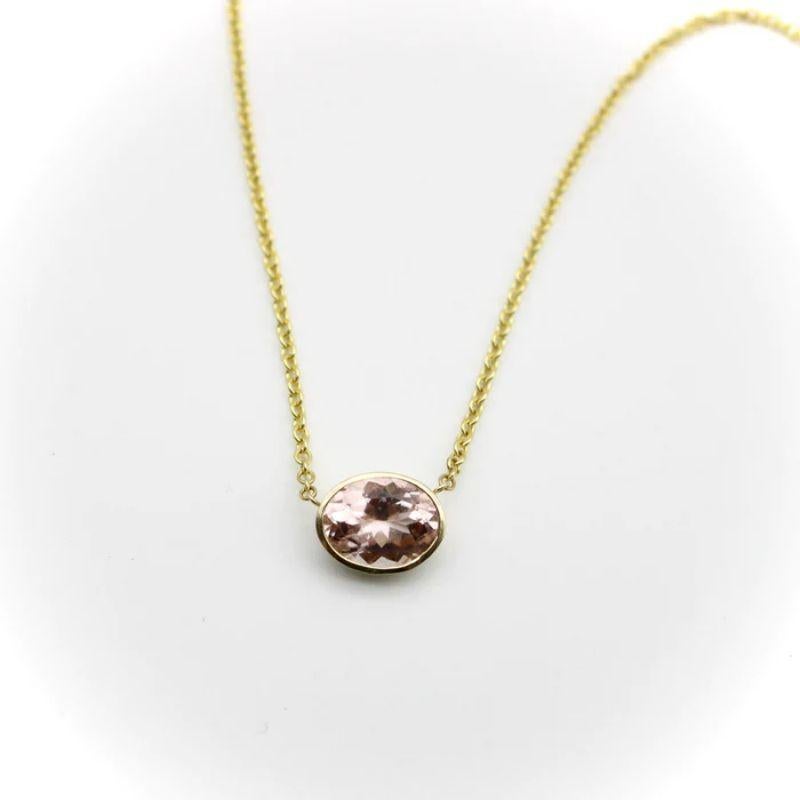 Contemporary 14k Gold Signature Bezel Set Pale Pink Tourmaline Necklace For Sale