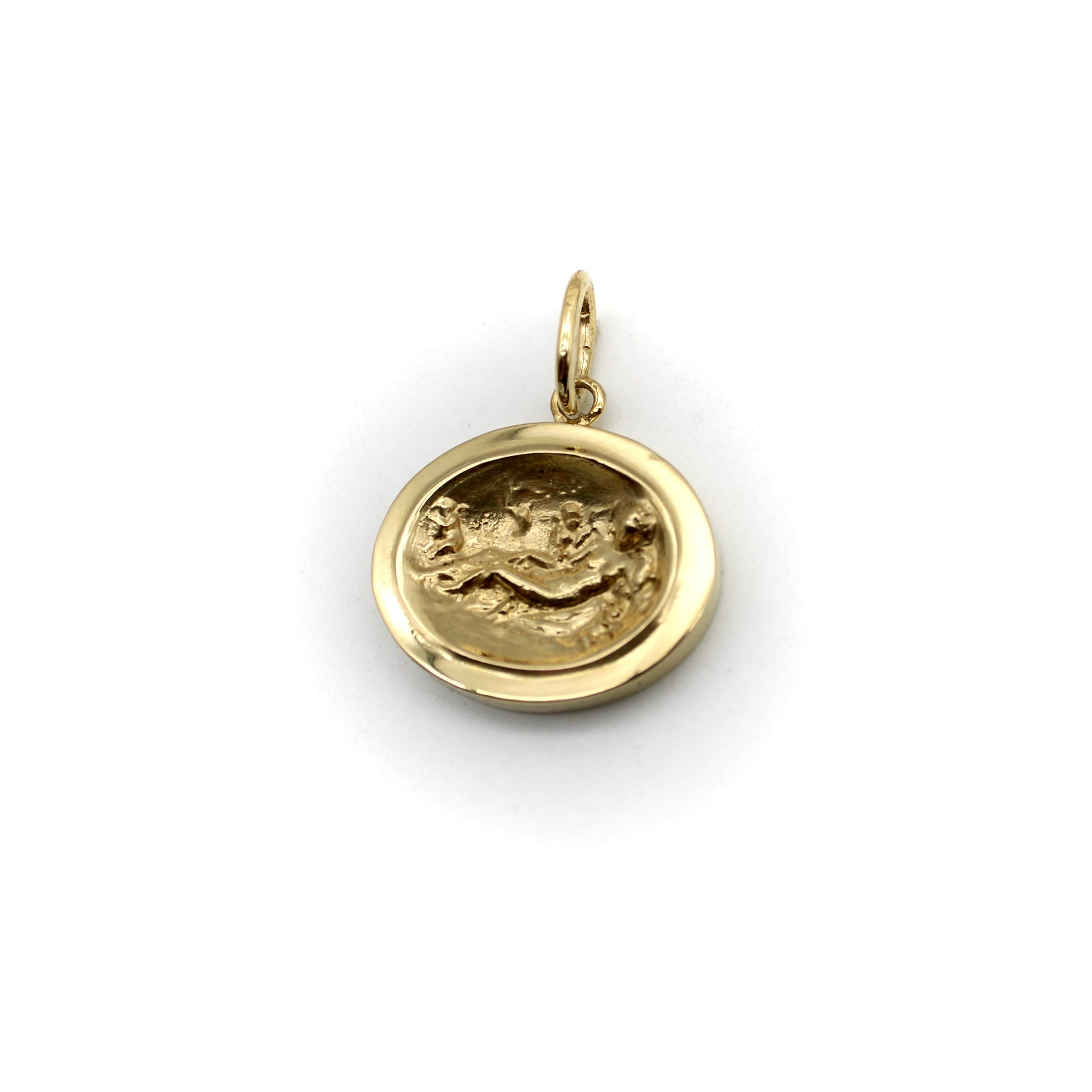 Created as part of our signature collection, this 14k gold intaglio medallion depicts Aphrodite lounging luxuriously, surrounded by winged putti who seem to be attending to her every need. A sensuous tree climbs across the backdrop, suggesting the