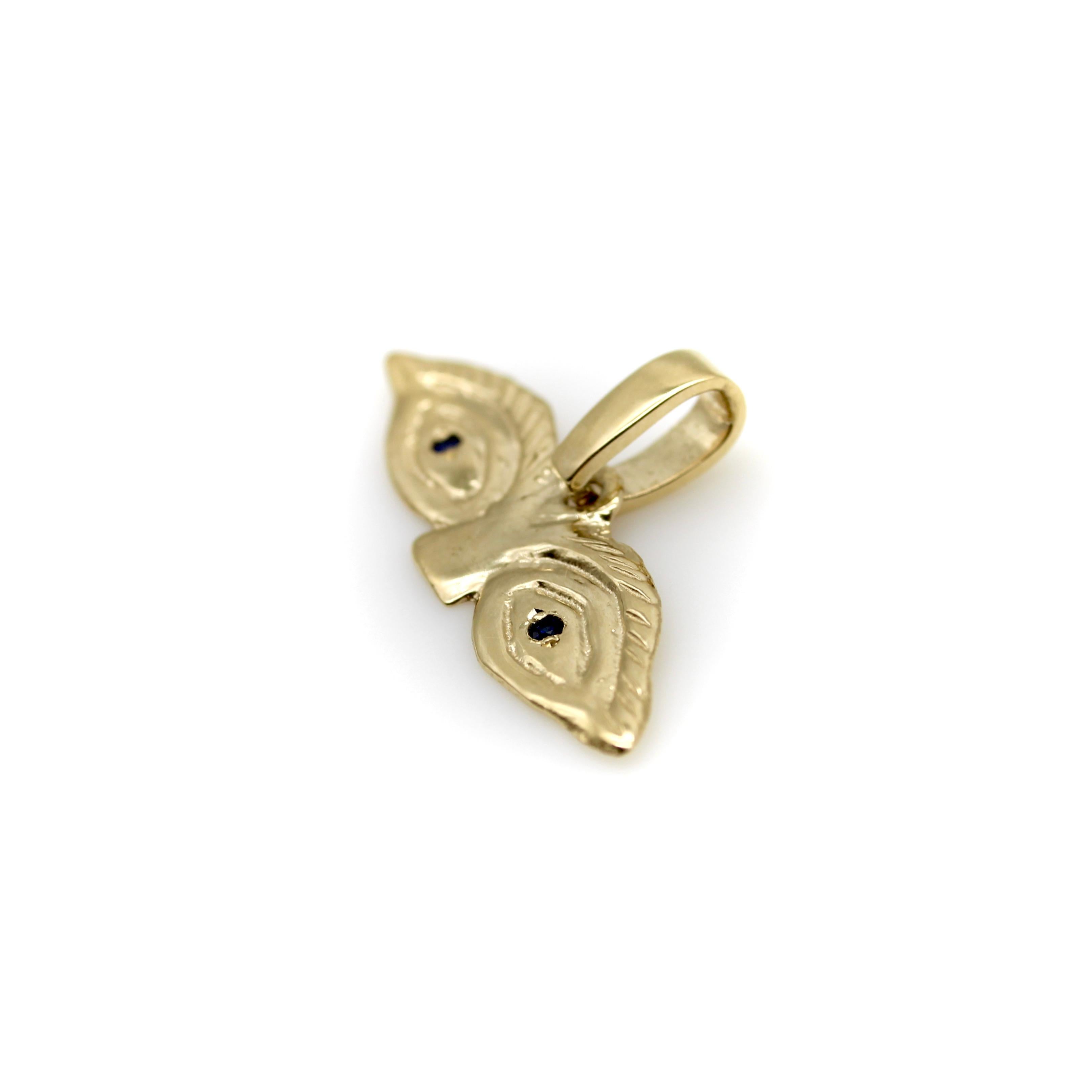 Round Cut 14K Gold Signature Eye Milagro Charm Pendant with Sapphire Eyes For Sale