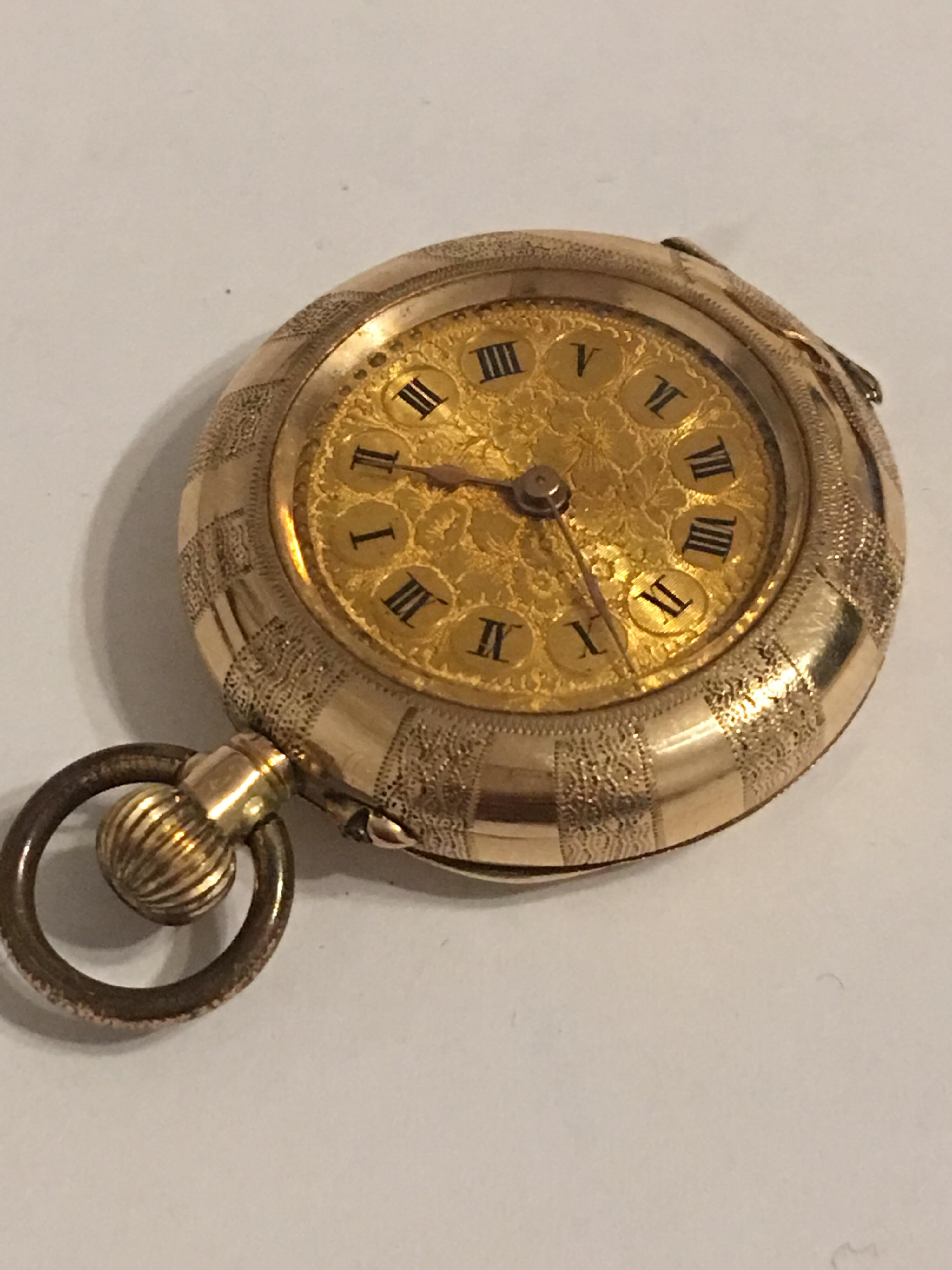 This beautiful fully Engraved Case small 31mm pocket watch is working and ticking well . the metal ring or Loop is tarnished. It weigh 24.6grams