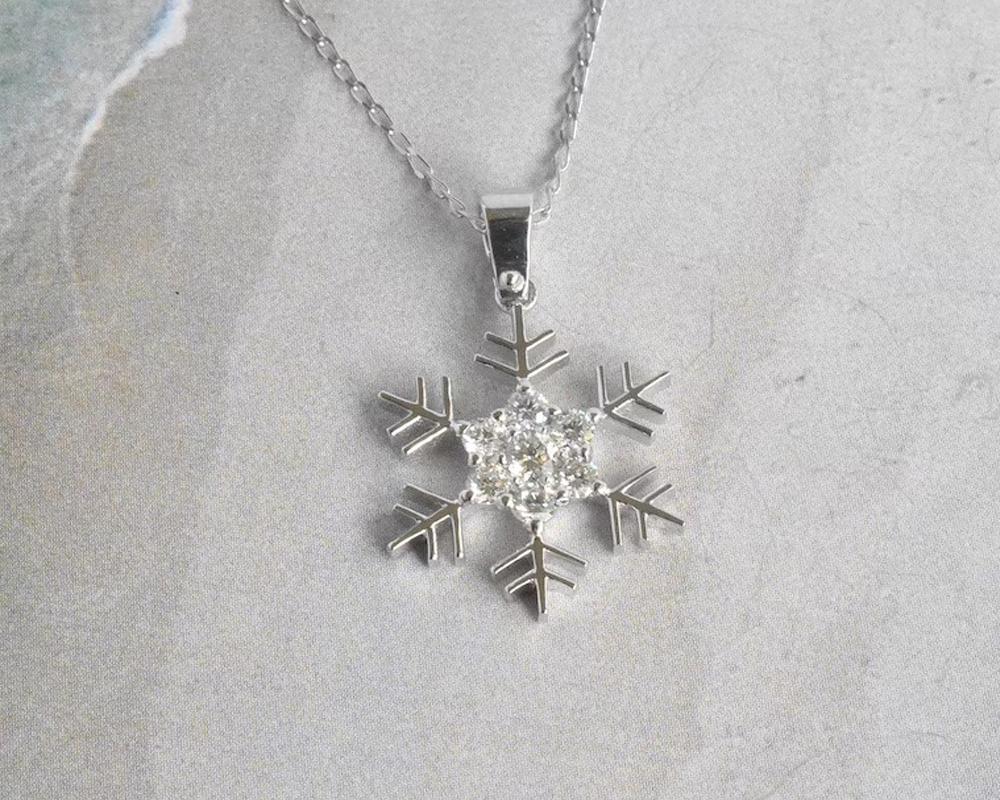 Snowflake Diamond Pendant is made of 14K solid gold available in three colors, White Gold / Rose Gold / Yellow Gold.

Gold Necklace showcasing 31 Brilliant Round Cut, Natural and ethically sourced diamond pave set by master setter at jewelsbyterry