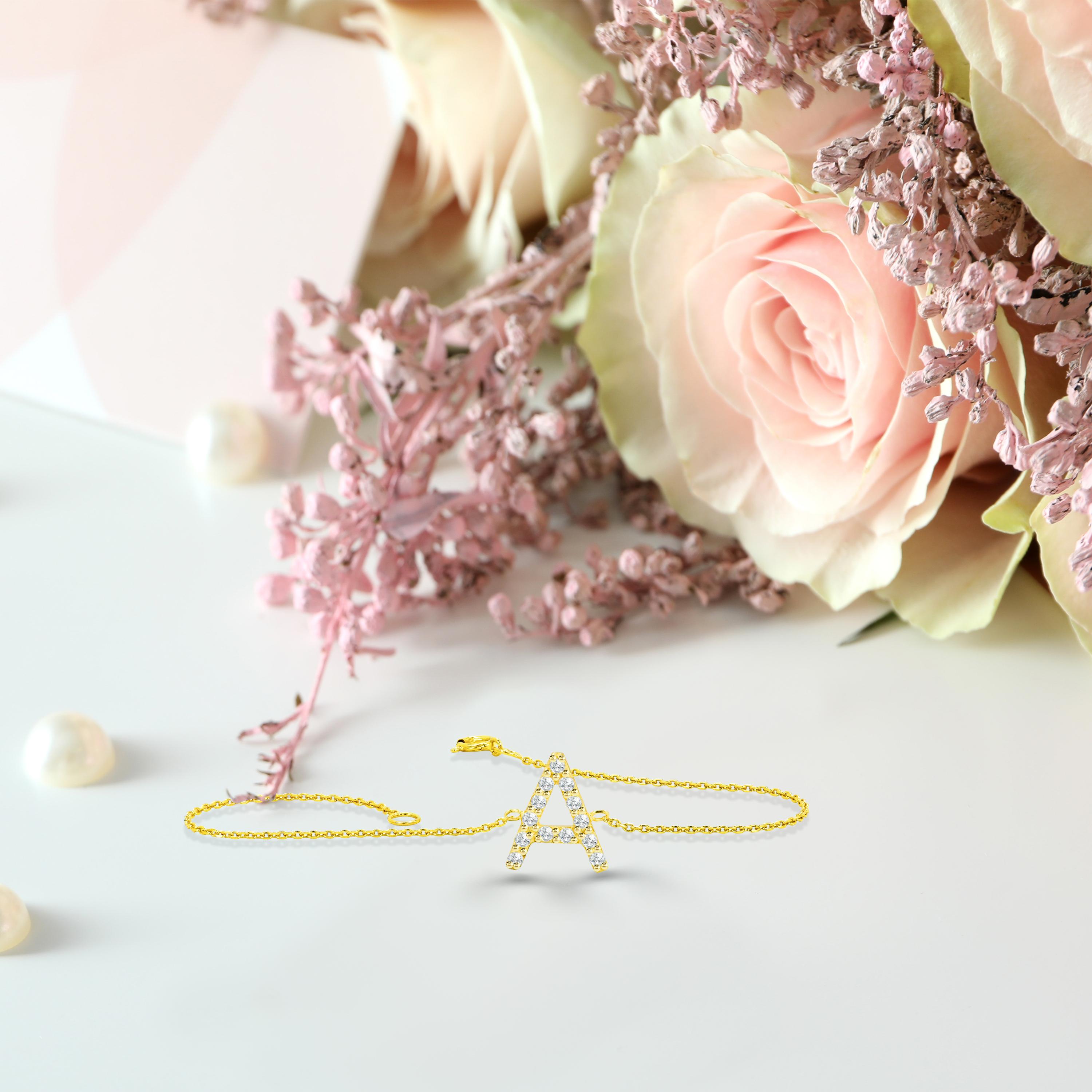 Modern 14K Gold 0.12 Ct Diamond Initial Bracelet For Sale