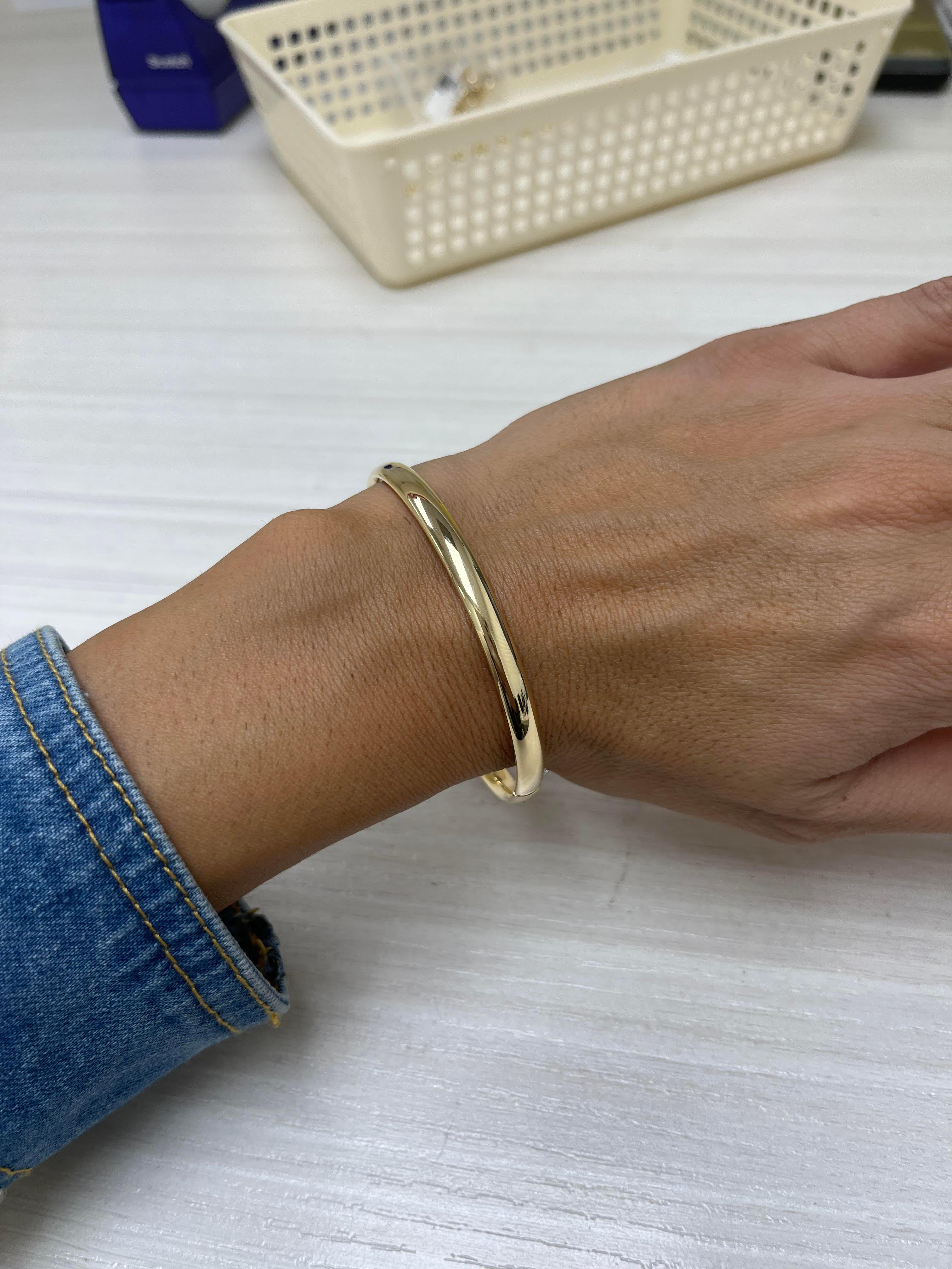 14K Gold Stackable Bangle in 5MM. Dimension is 7 inches.

This piece is perfect for everyday wear and makes the perfect Gift! 

We certify that this is an authentic piece of Fine jewelry. Every piece is crafted with the utmost care and precision.