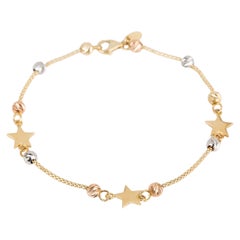 Bracelet en perles délicates avec breloques étoiles en or 14K