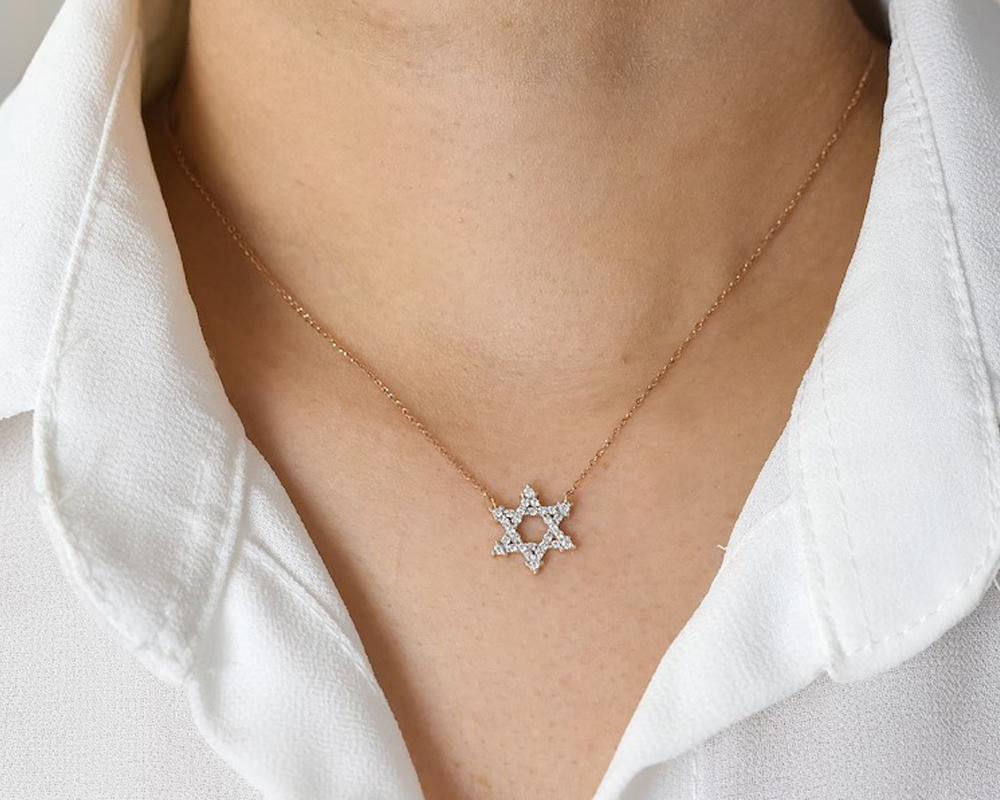 Delicate Dainty Star of David Charm Necklace with natural diamond is made of 14k solid gold.
Available in three colors of gold: White Gold / Rose Gold / Yellow Gold.

Lightweight and gorgeous natural genuine round cut diamond. Each diamond is hand