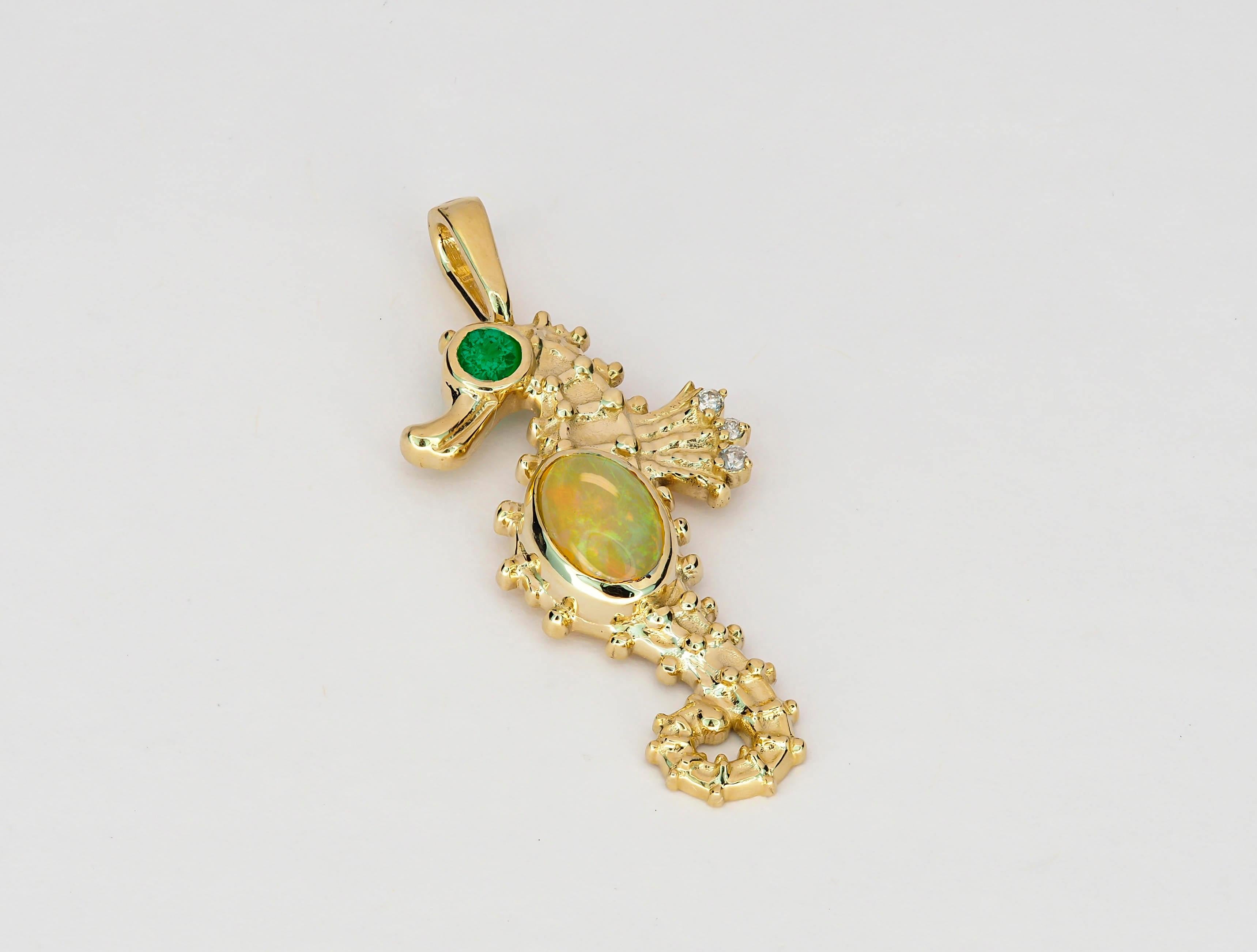 14 kt solid gold starhorse pendant with natural opal, emerald and diamonds. October birthstone.
Size: 31 x 13.5 mm.
Total weight: 2.20 g.

Gemstones:
Opal: oval cabochon shape, orange-yellow with color flash on pen light, transparent, 1.00