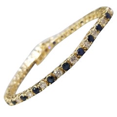 14K Gold Tennis Bracelet with 25 Diamonds N Sapphires Estimated Weight 2.50 Ct
