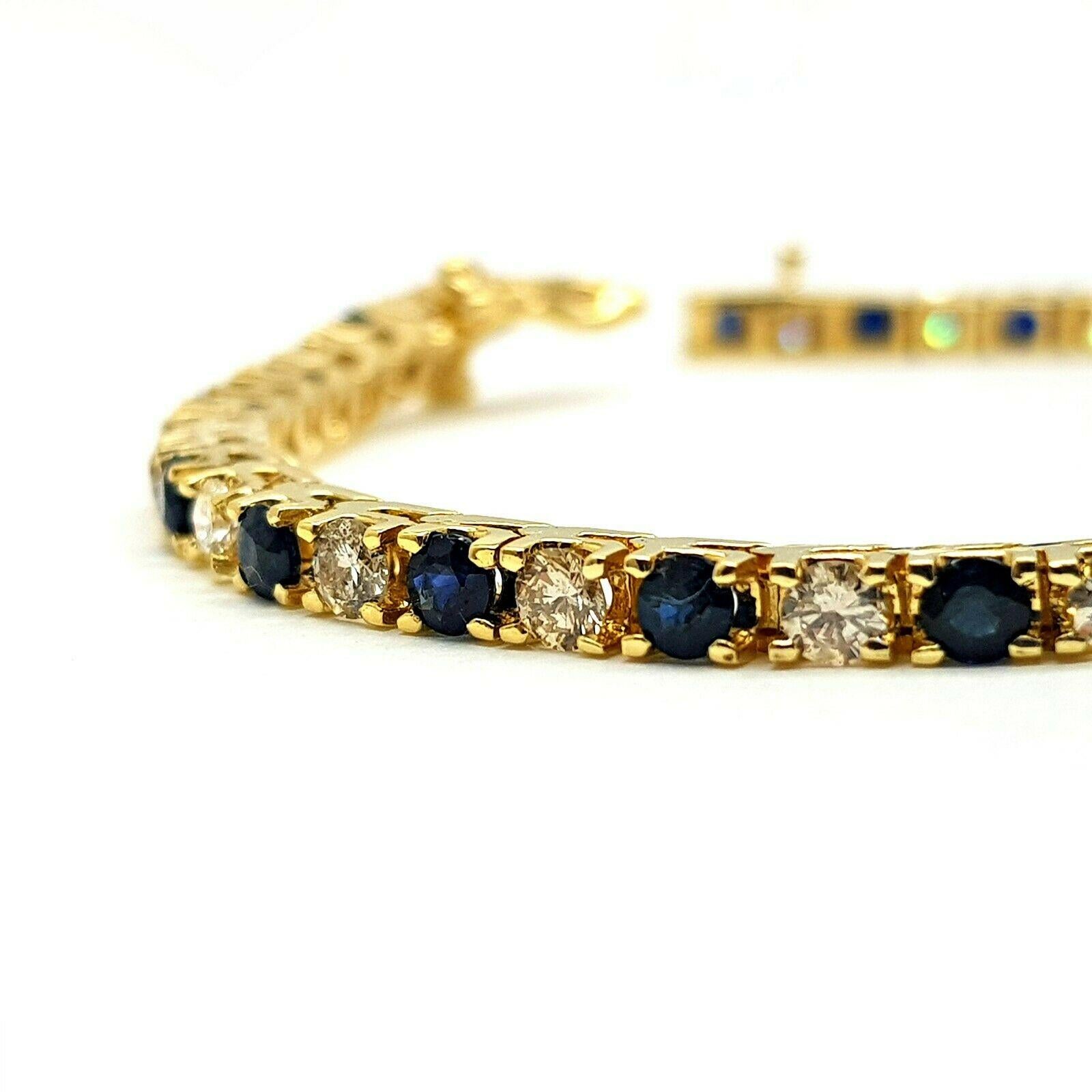 This is a 14k yellow gold custom made tennis bracelet with 25 round diamonds estimated 2.50ct in total weight and 25 blue sapphires. 
Specifications:
    main stone: BLUE SAPPHIRE EST. 2CT/ 25 PCS
    additional: DIAMOND
    diamonds: 25 PCS
   