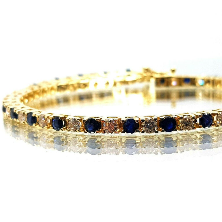14K Gold Tennis Bracelet with 25 Diamonds N Sapphires Estimated Weight