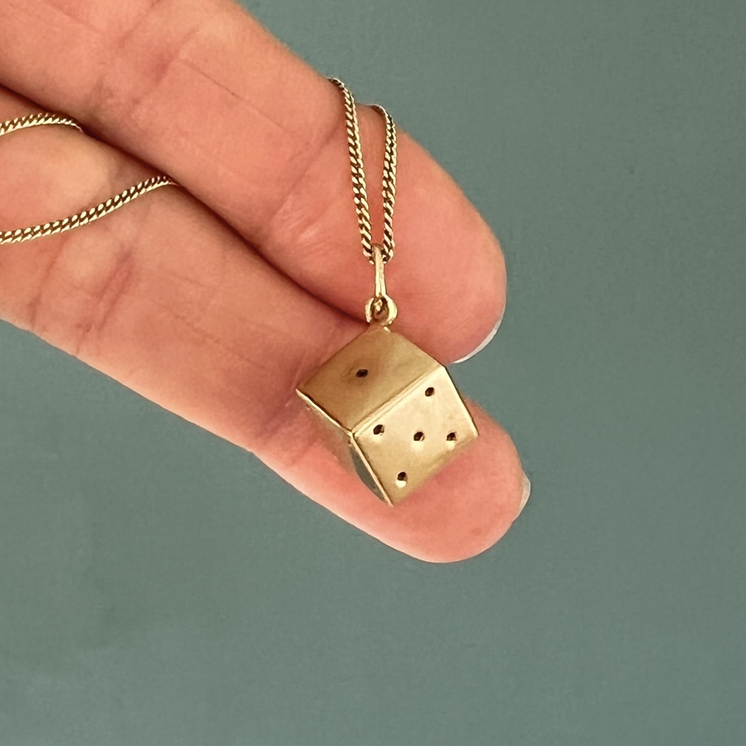 gold dice pendant