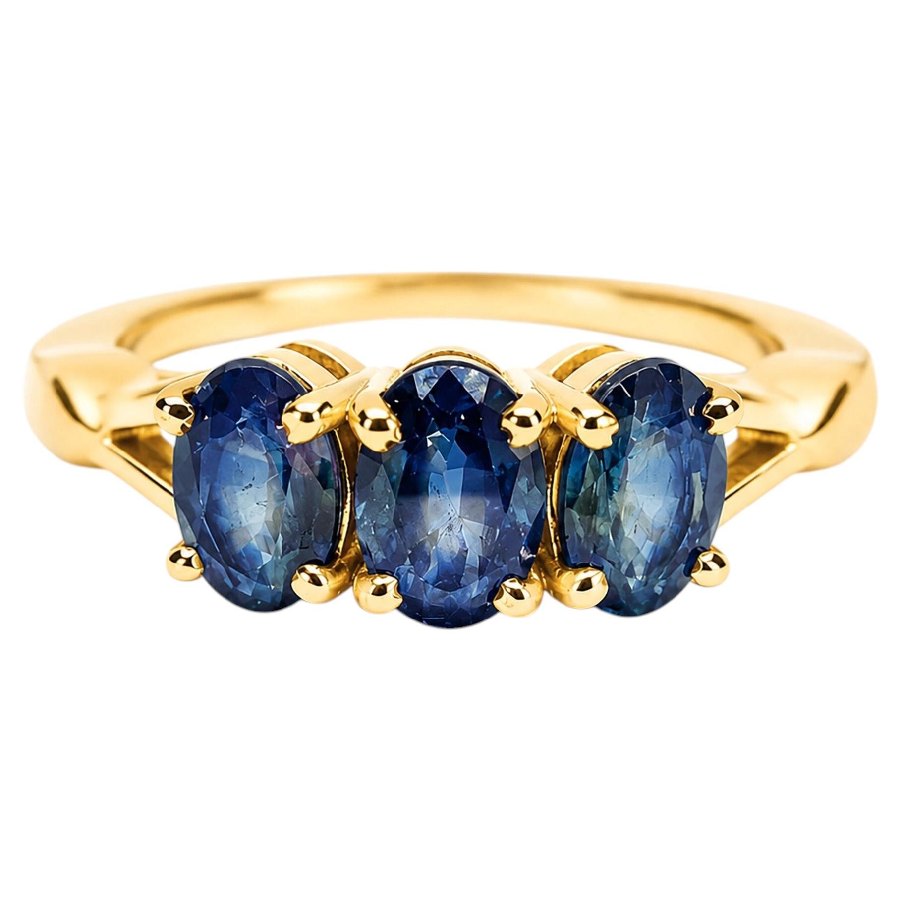 14-Karat-Gold-Ring mit drei blauen Saphiren, 1,65 Karat, Jubiläumsring mit blauen Saphiren im Angebot