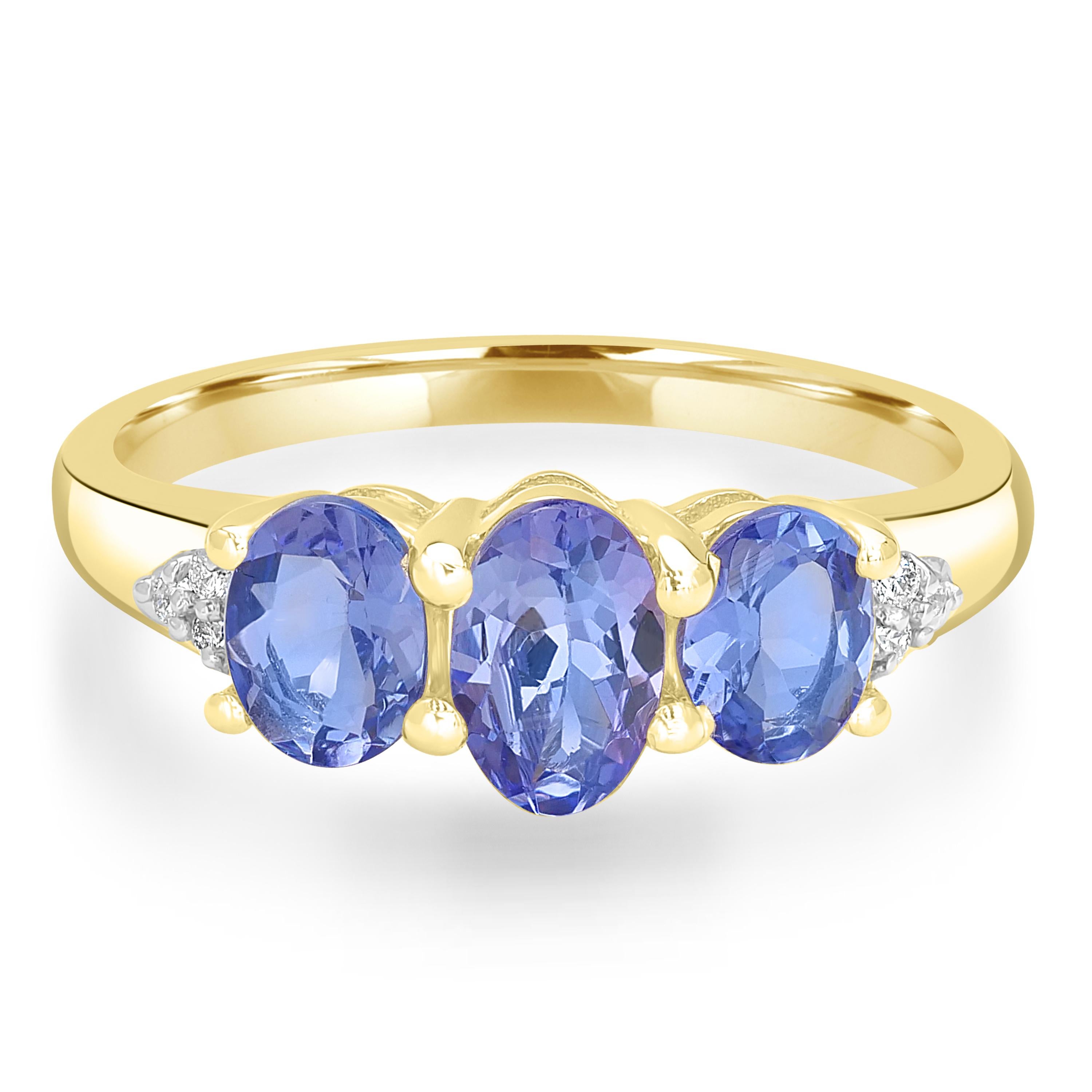 Beaming a bold color, this Gemistry gorgeous oval tanzanite three-stone ring is sure to be a showstopper. Three oval-cut, prong-set 1.14-carat Tanzanite at the center with round-cut, prong-set white diamond accents mounted on polished 14k gold make
