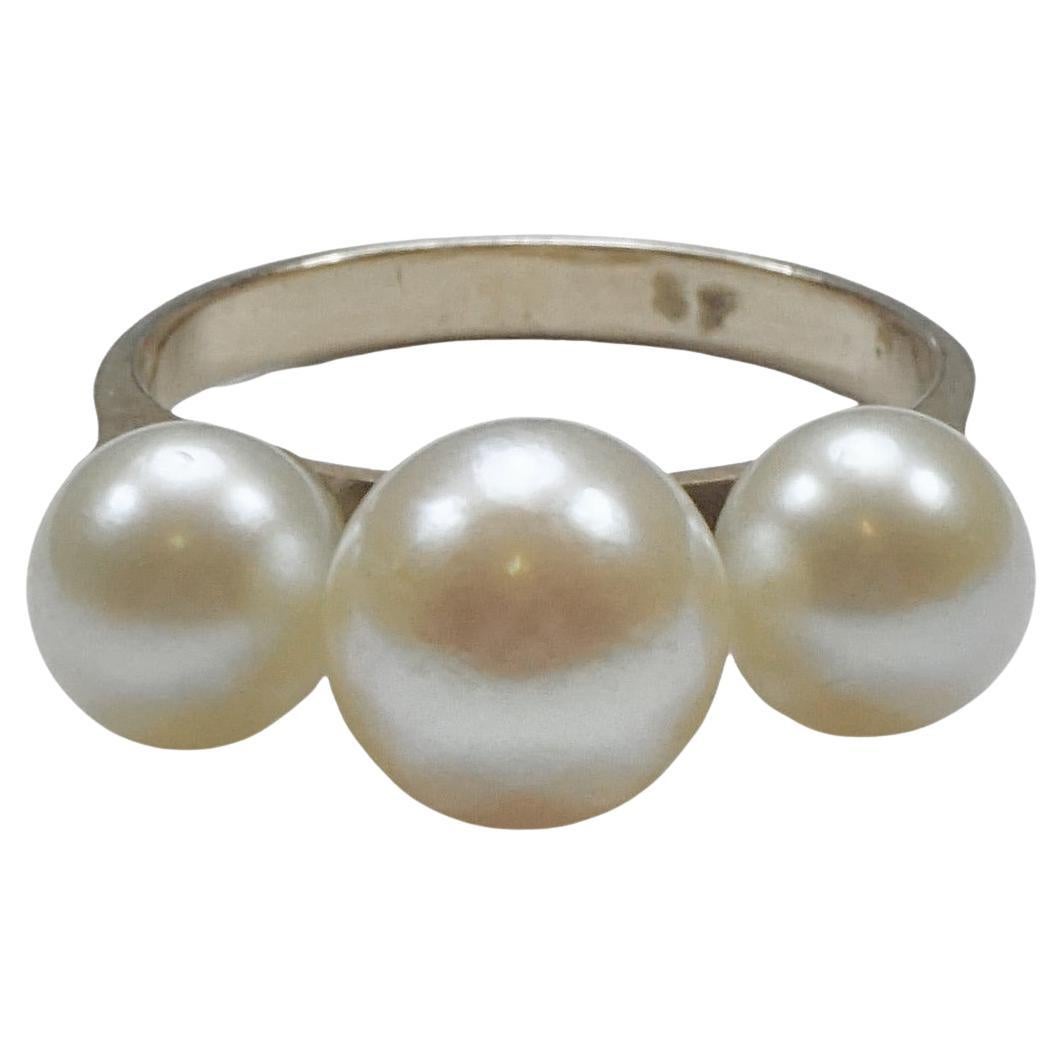 Anillo de oro de 14 quilates con triple perla cultivada