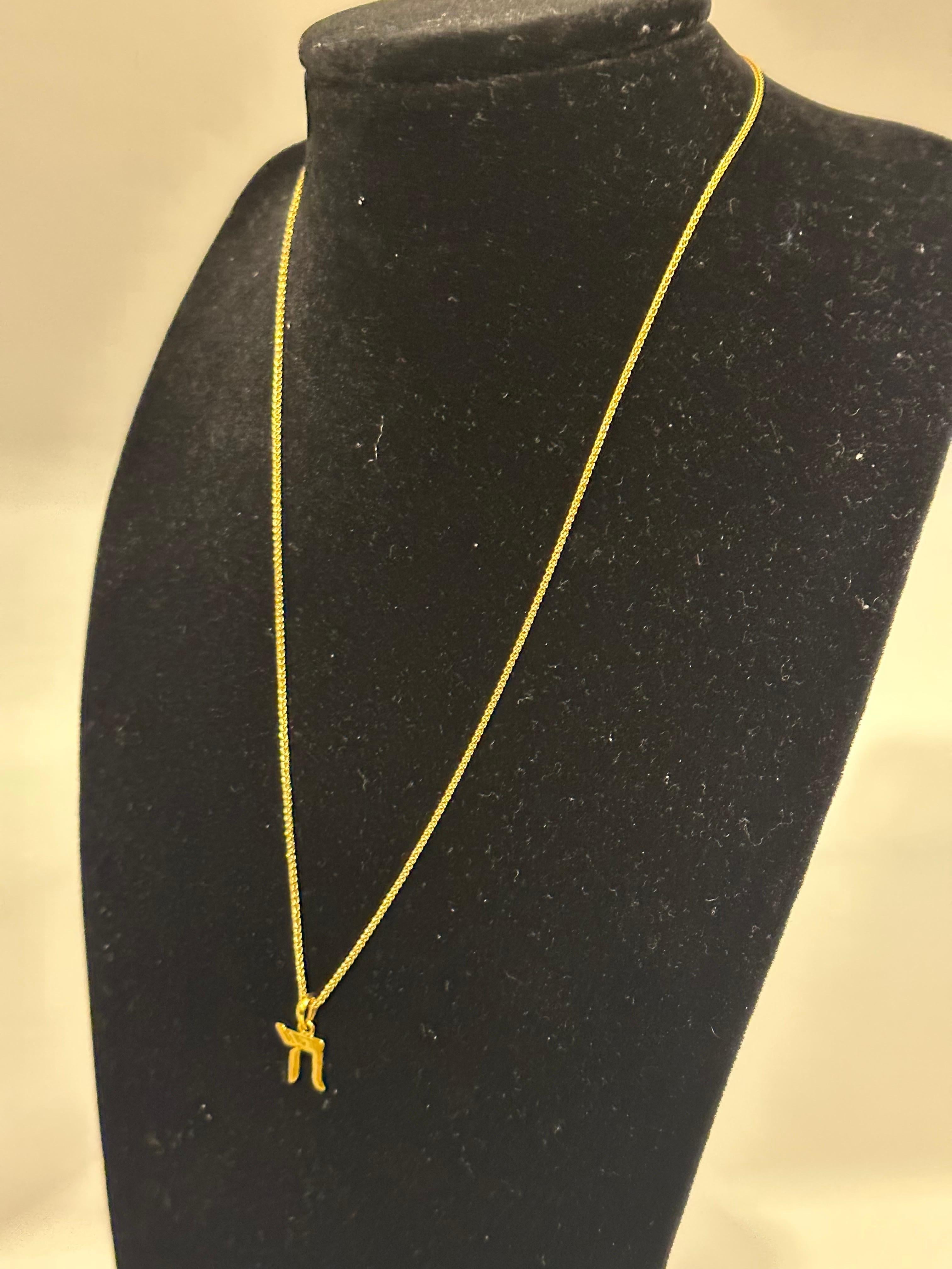 14K Gold Masculine Chai Pendant With 14 Karat Yellow Gold Chain, Jewish Jewelry
This Simple yet elegant Necklace  consisting of a solid 14 Karat gold  Chai pendant and 14 Karat Yellow gold chain 
Unisex
Chain Length 16 inch adjustable to 18 