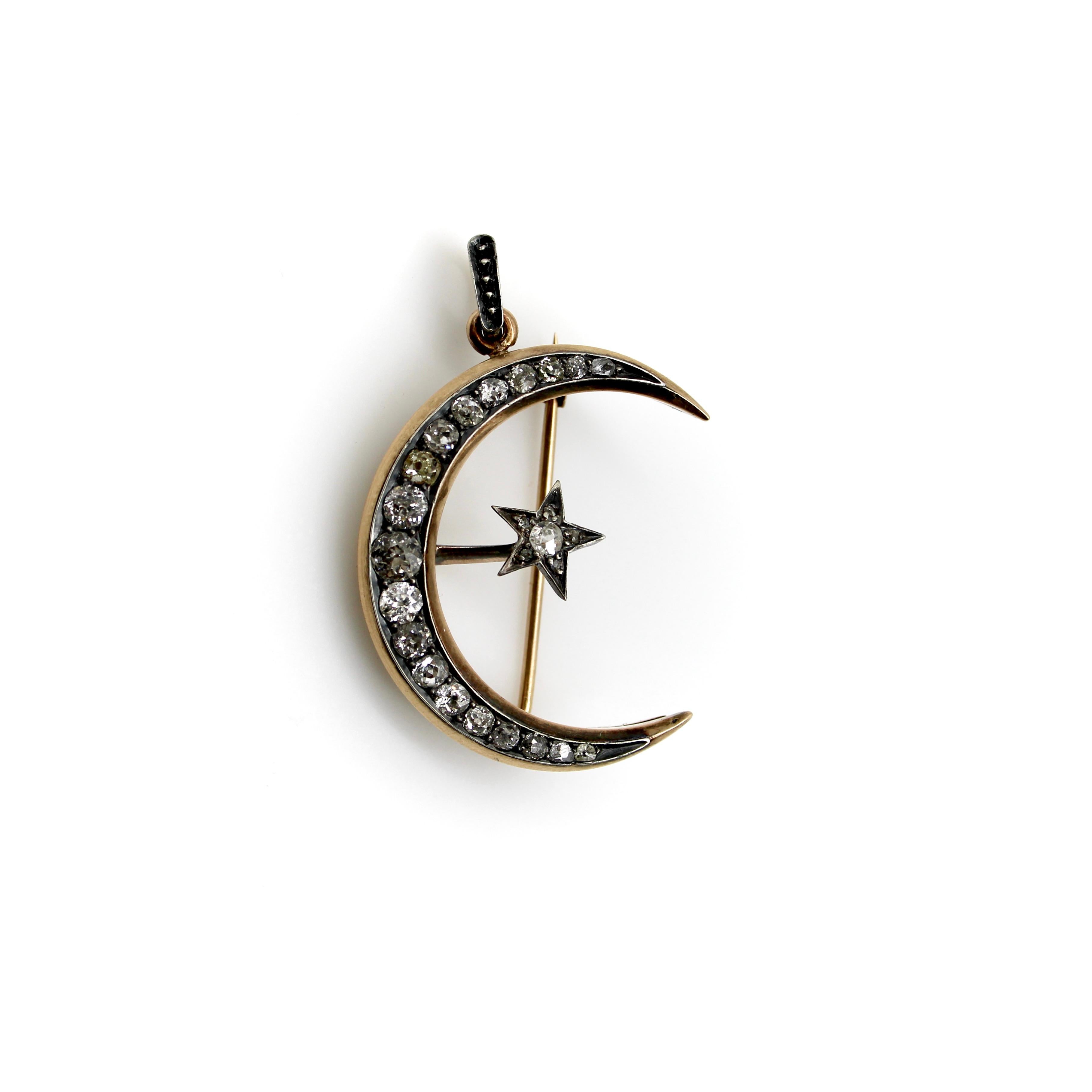 Circa the Victorian era, this 14k gold crescent moon can be converted into either a brooch or pendant. The moon and star are encrusted with Old Mine Cut and Rose Cut diamonds, with a silver front, rose gold back, and wonderful patina that emphasizes