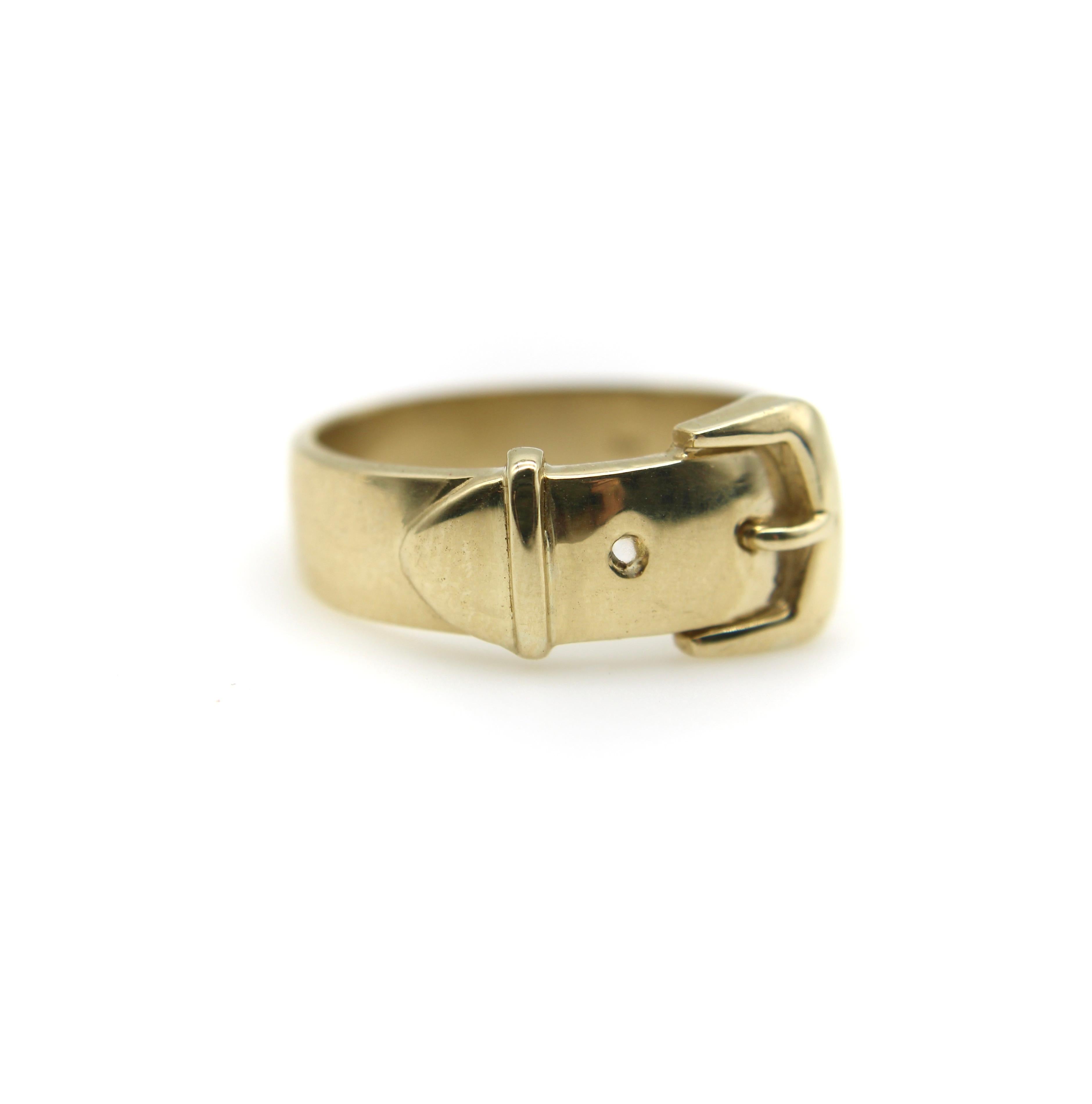 This 14k gold Victorian inspired ring is the perfect expression of everlasting love. Made popular by Queen Victoria, buckle rings were a favorite motif during the 19th century and have remained in fashion ever since. The buckle symbolizes an