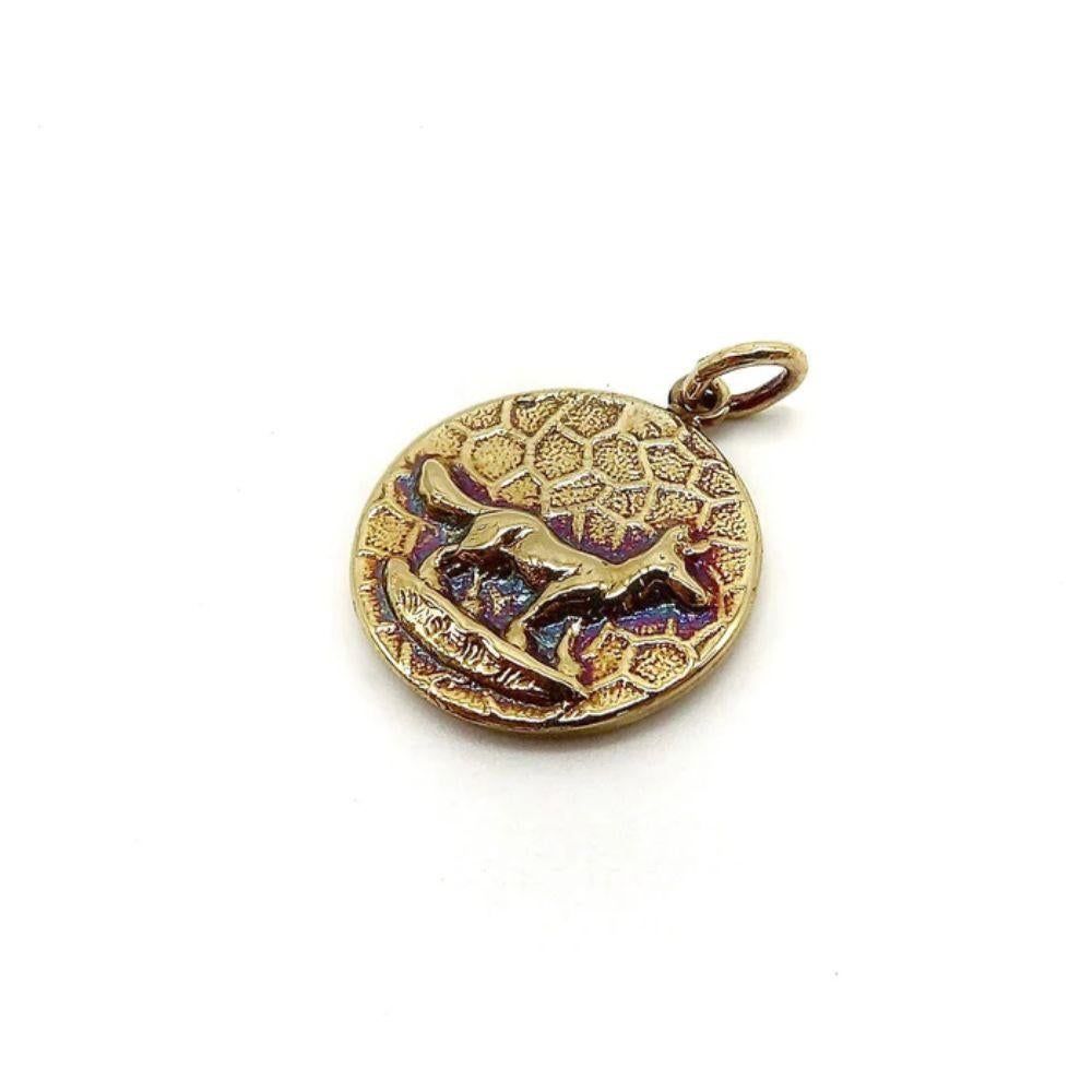 


This is a precious 14k gold medallion charm from Kirsten’s Corner signature “Cute as a Button” collection. It is handcrafted from a Victorian era button and features a standing profile of a fox against honeycomb background. The pedant has a 14.5