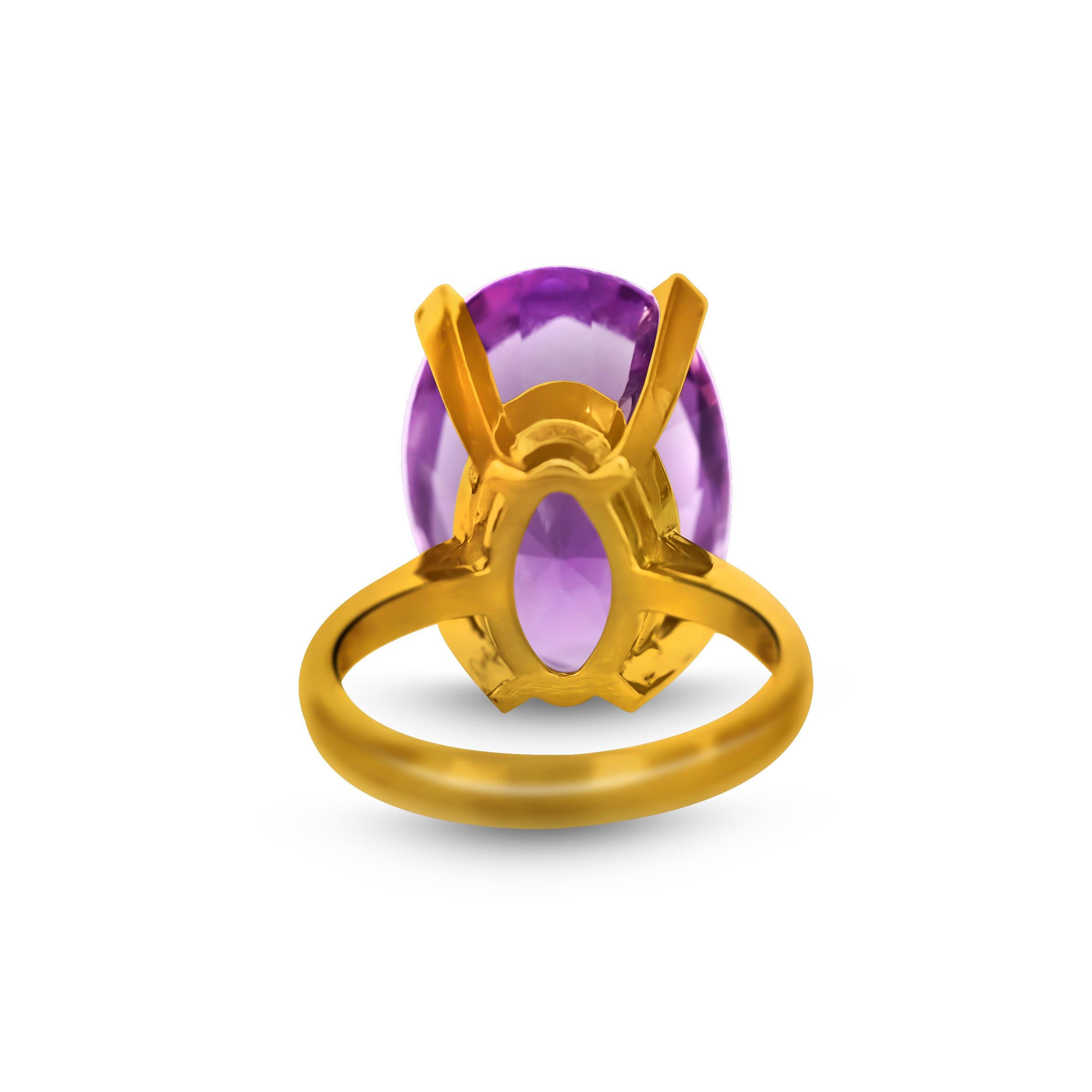 14K yellow gold ring with 5.0 ctw Purple amethyst center stone. 
Amethyst size: 16.87 mm long, 11.86 mm wide.
Clarity: eye clean. 
Carat: 5.0
Total weight: 5.54 grams.

