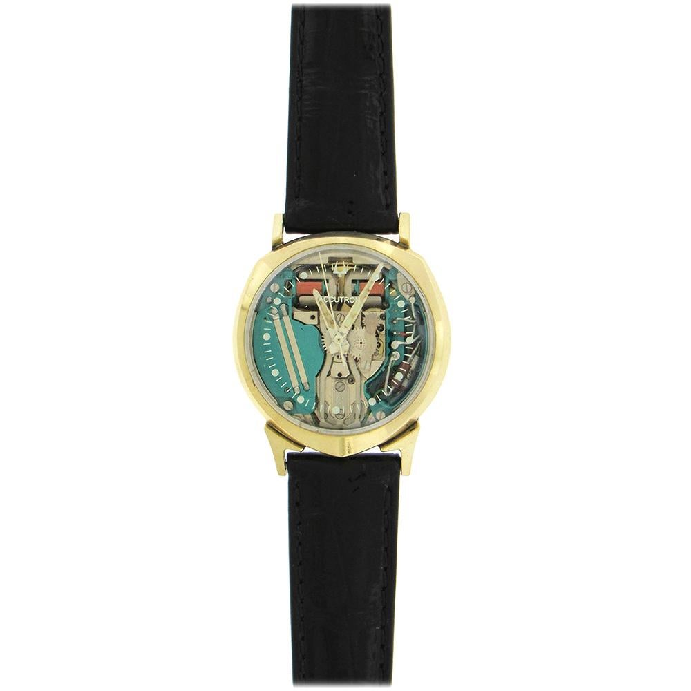 Extremely rare 14K solid yellow gold Bulova Accutron asymmetrical Spaceview ‘Alpha’, dated 1961, with the shield-shape case, and signature visible jade movement. The electro-mechanical battery powered movement is warrantied by Aaron Faber for 1 year.