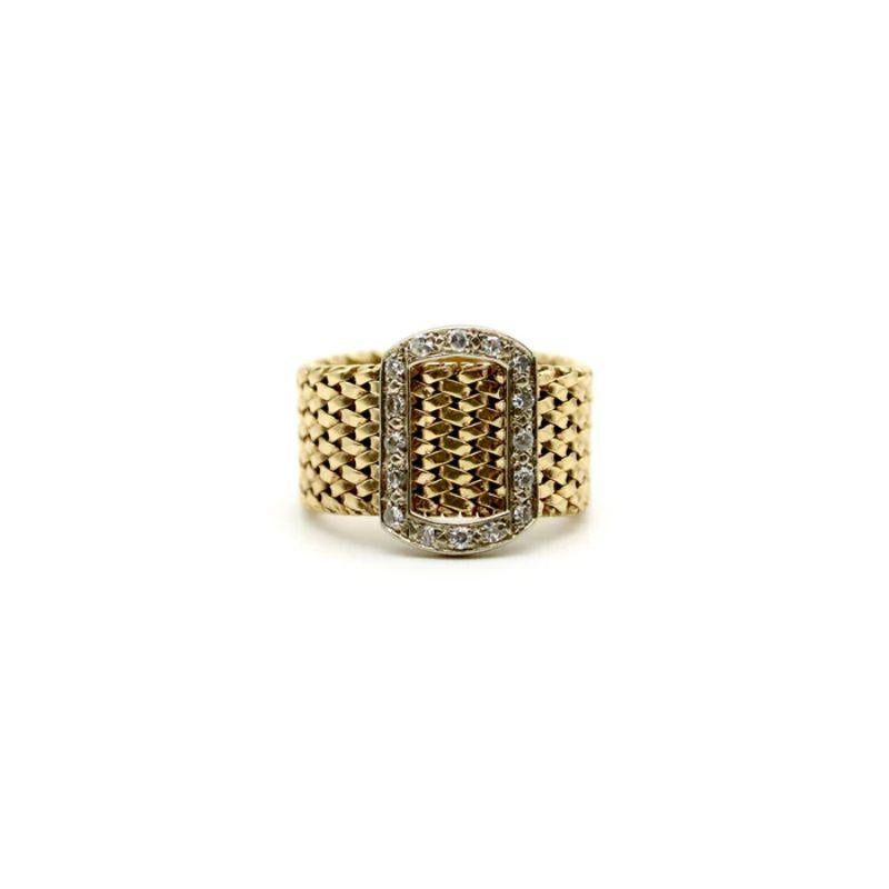 This beautifully woven wide mesh gold band is a statement in elegance. The mesmerizing pattern of the weave adds a gorgeous texture to the band, culminating in a central buckle for a classic look. On the buckle, sixteen single cut diamonds are bead