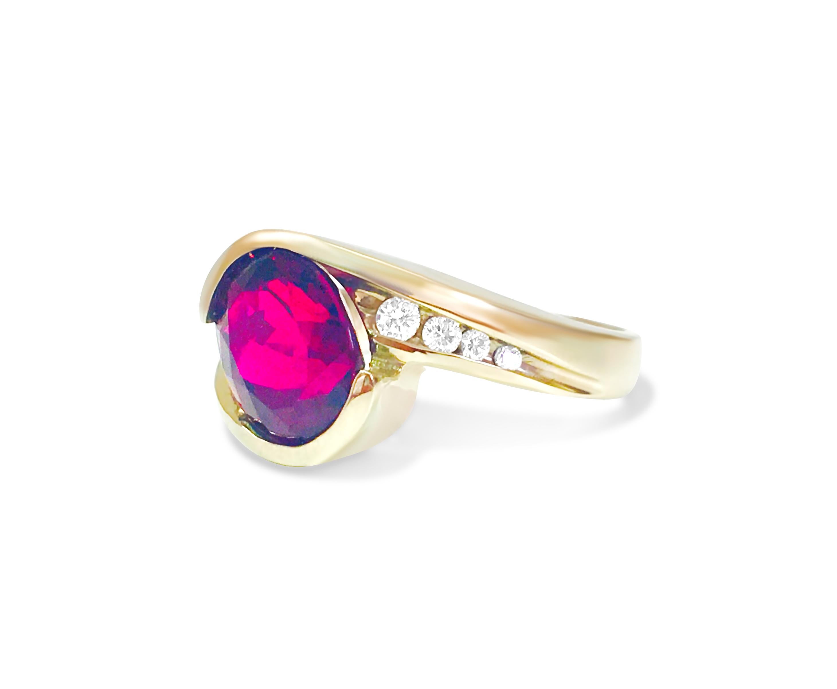 A ring made of 14k white gold with a beautiful oval-shaped rubellite gemstone and shiny round white diamonds. The rubellite is carefully cut, and the diamonds sparkle brightly.

Elevate your style with our 14k White Gold Rubelite & Diamond Ring, a