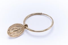 Pendiente de aro con medalla de la Virgen María de oro de 14k J DAUPHIN
