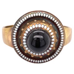 Bracciale con smalto bianco e granato cabochon in oro 14k