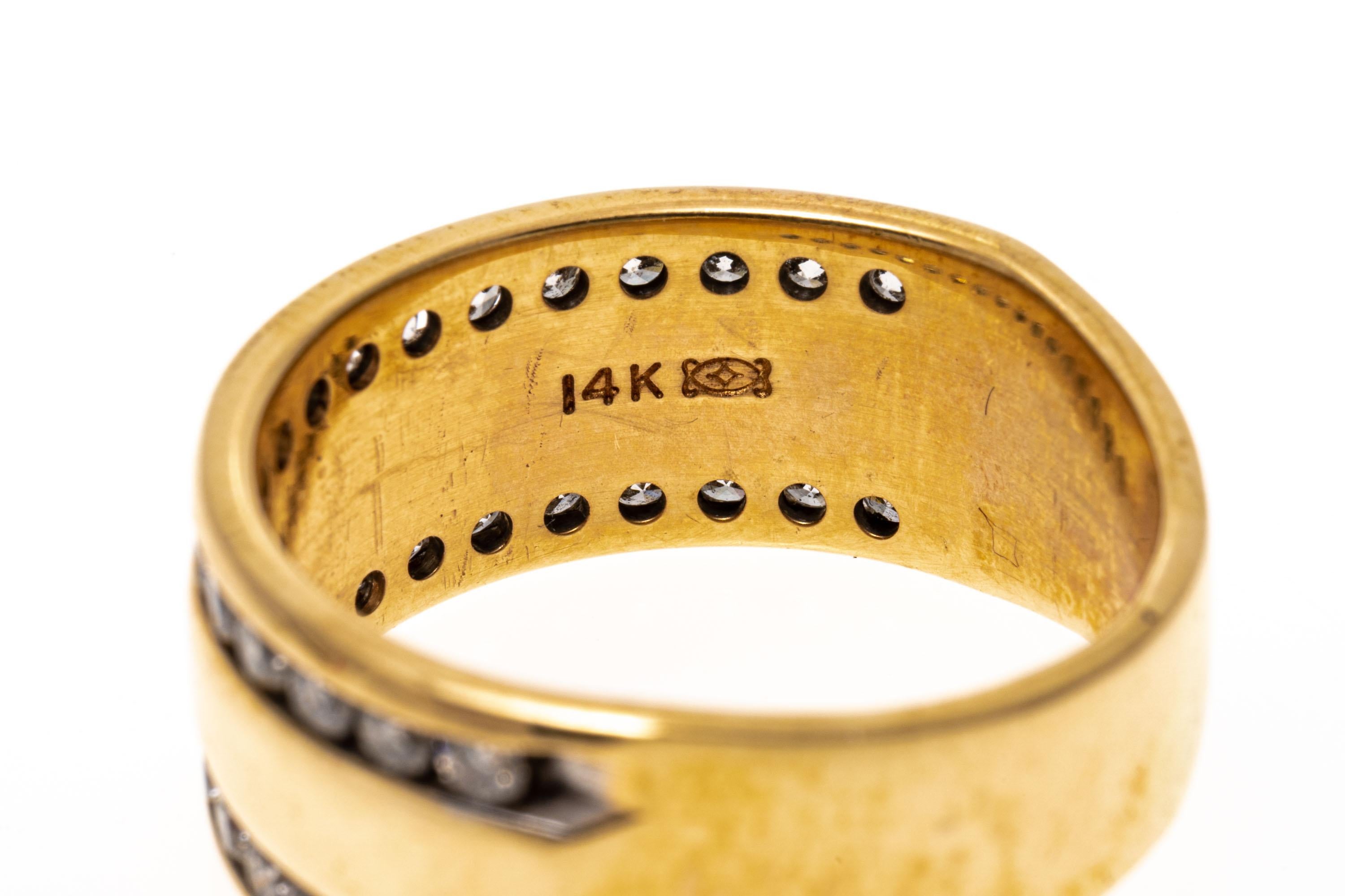 Contemporary 14k Gold Wide Band Edged With Channel Set Diamonds For Sale