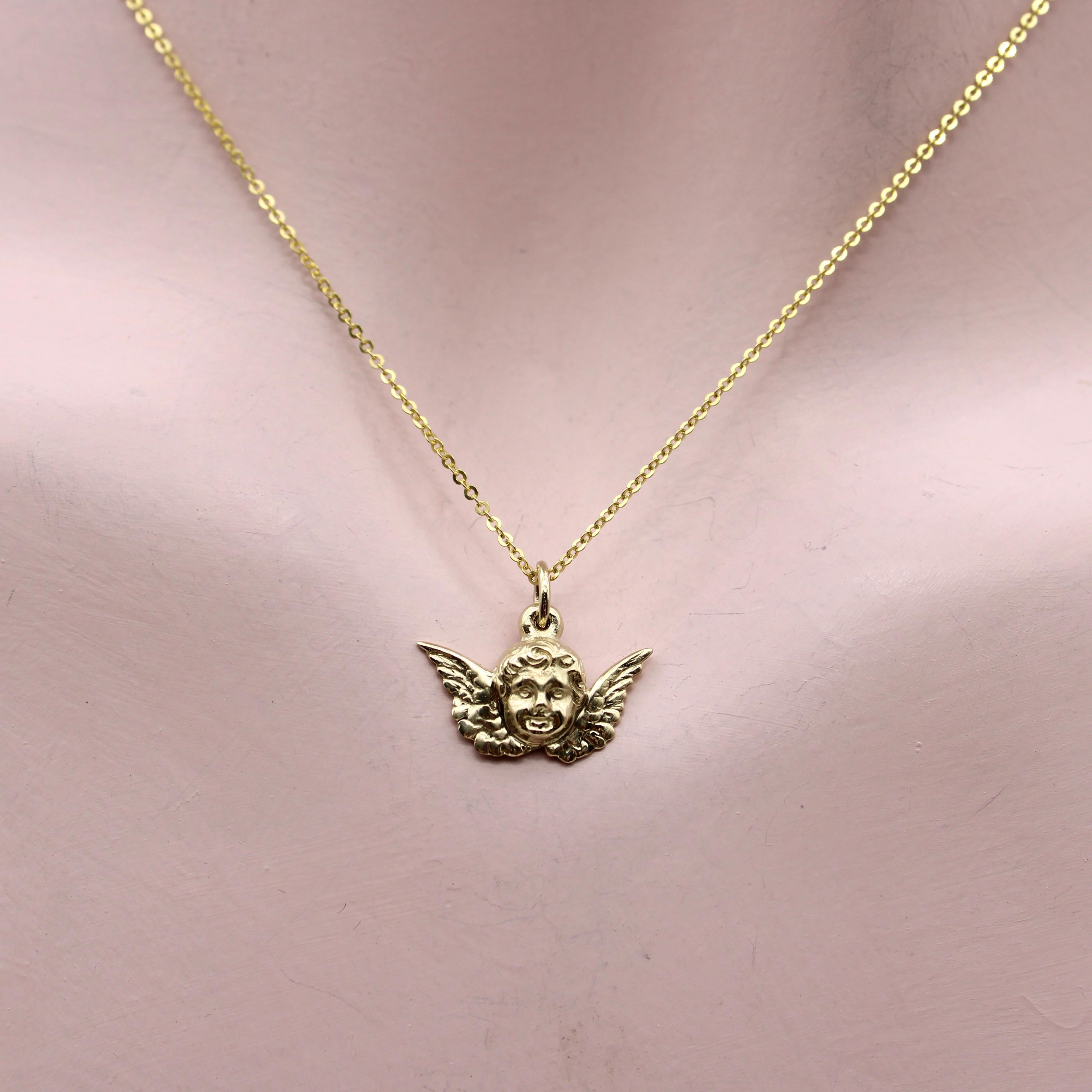 gold cherub pendant