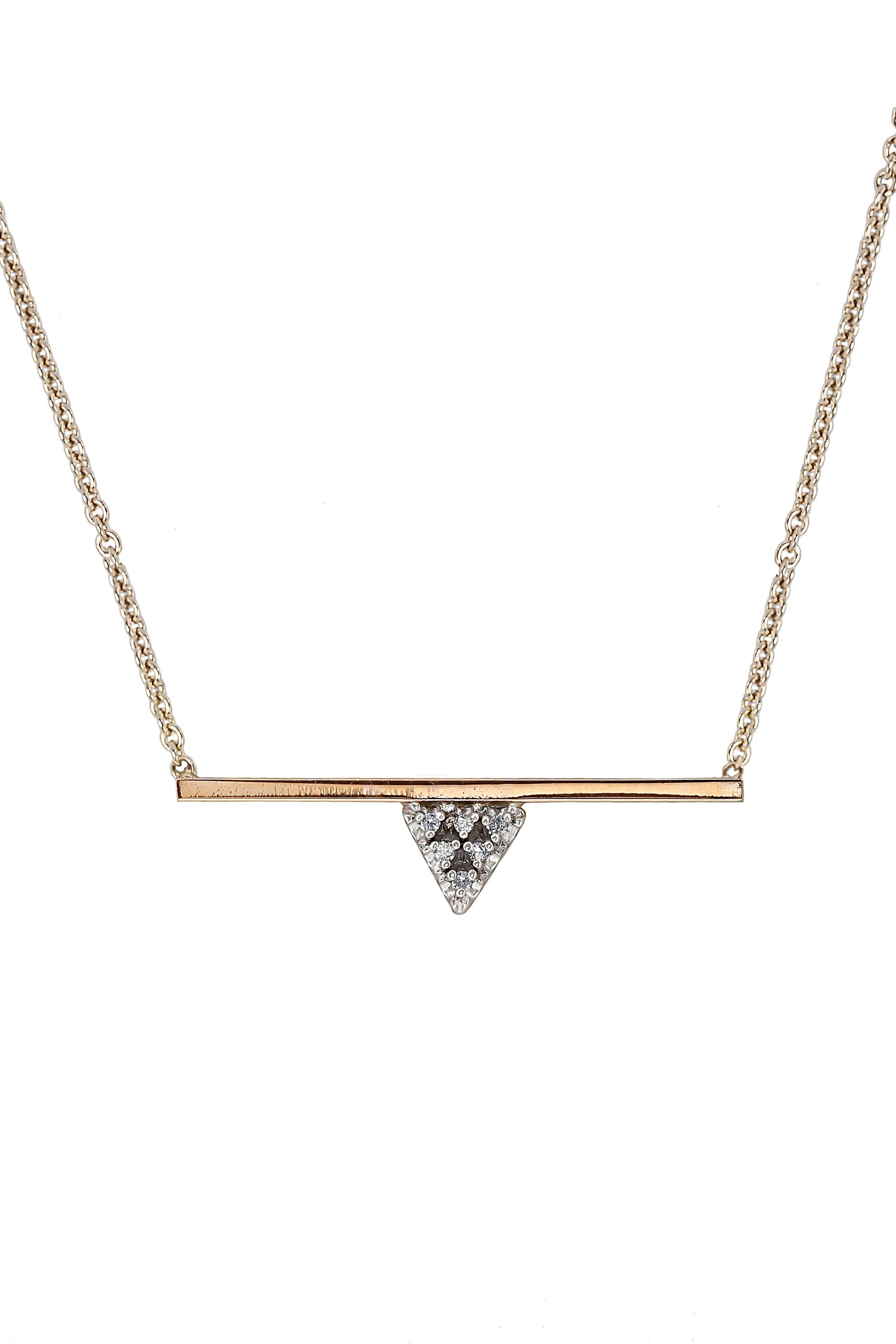 This modern and stunning 14K Yellow gold bar diamond triangle necklace is designed by Zoe Chicco. This bar pendant necklace features a 30mm sized 14k yellow gold bar pendant with 6 round brilliant cut white diamonds weighing approx. 0.06ctw.