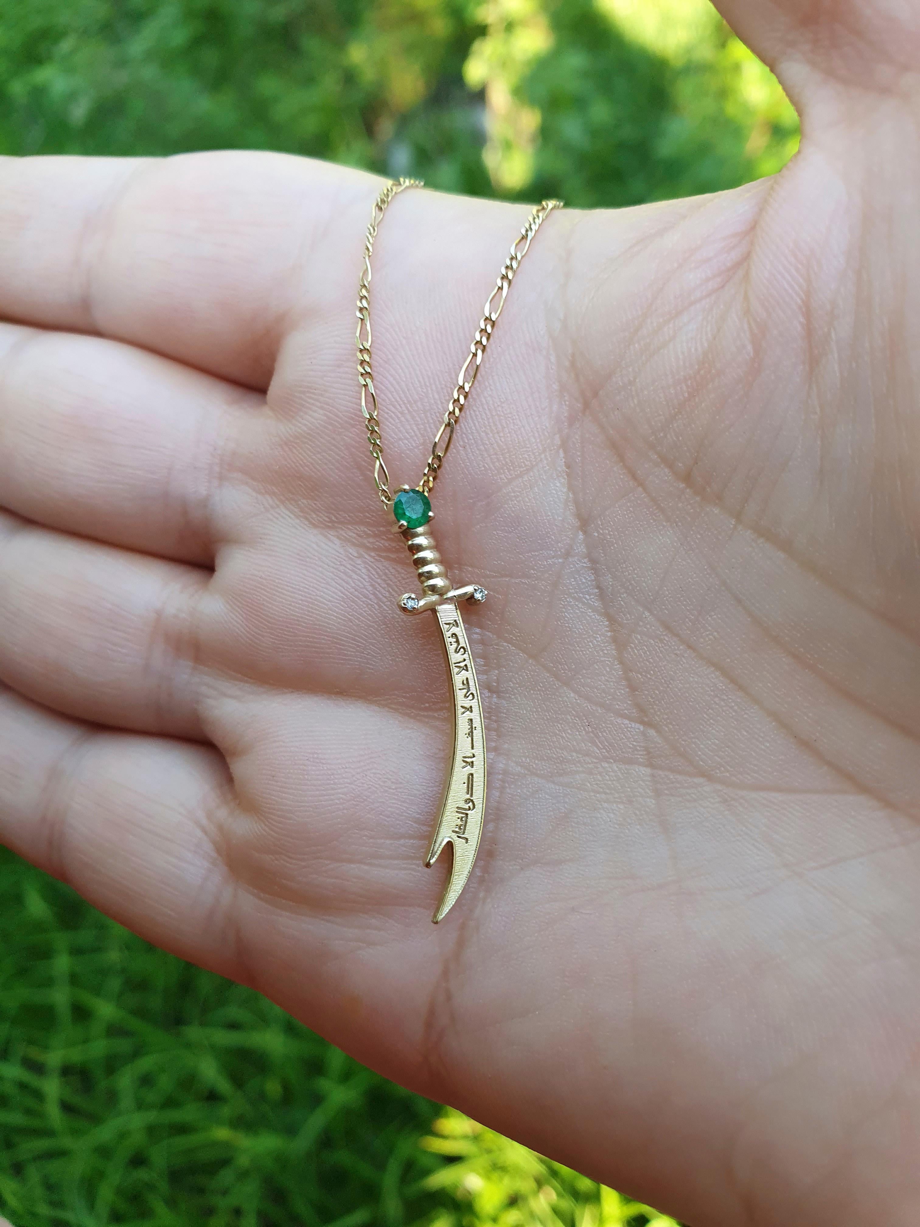 Modern 14K Gold Zulfikar sword pendant with emerald, diamonds. 