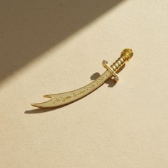 14K Gold Zulfikar sword pendant with yellow sapphire