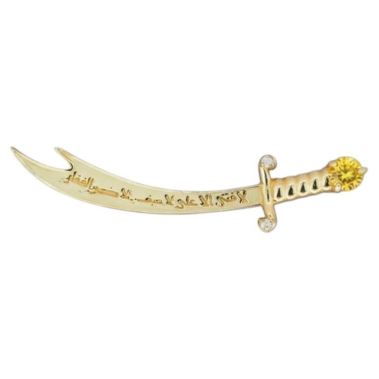 14K Gold Zulfikar sword pendant with yellow sapphire