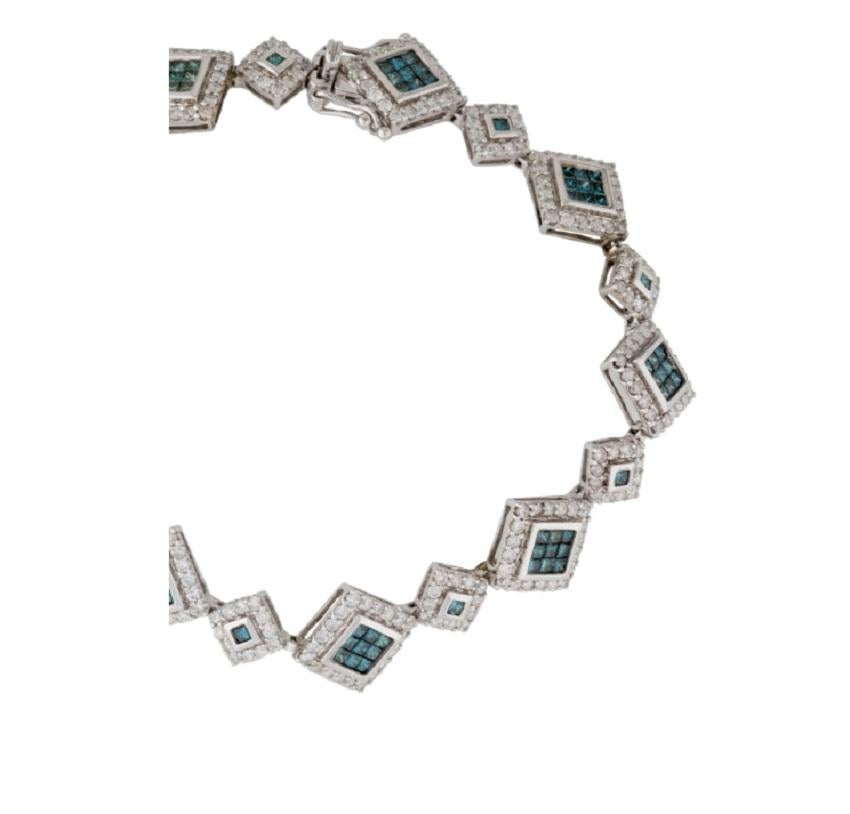 Beautiful bracelet made of real natural diamonds and solid 14 k white gold. White diamonds encircle the blue diamond that is in its natural state. When you are about to halt the performance, the bracelet's Push Clasp, Double Latch, will make sure it