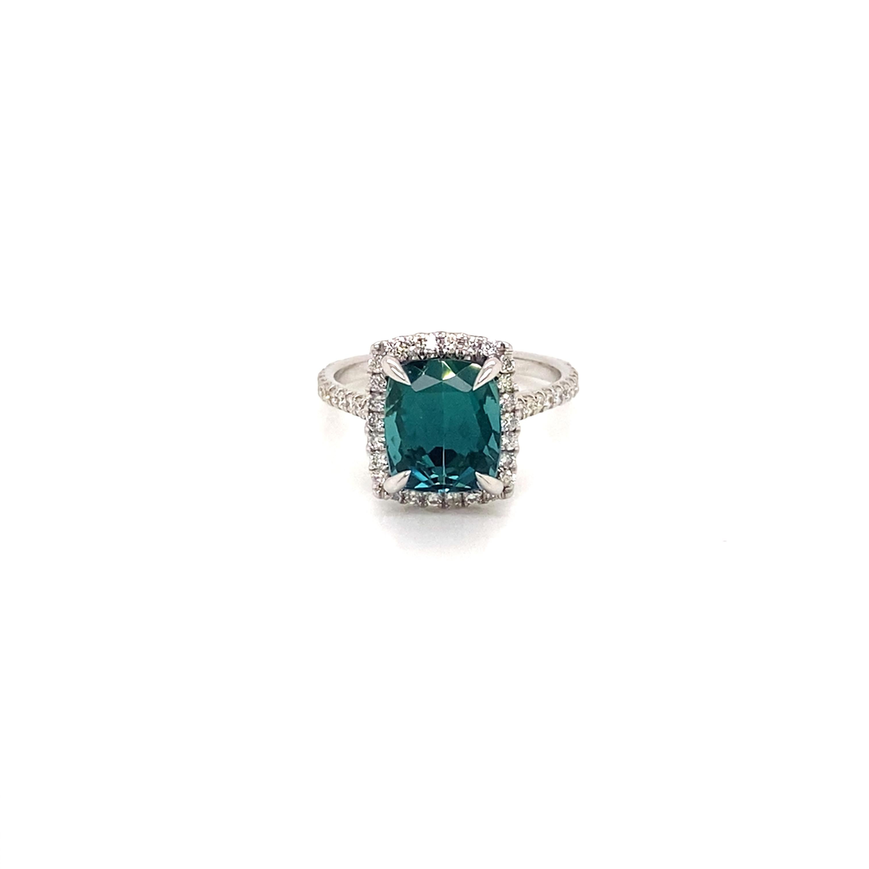 green cushion cut diamond ring