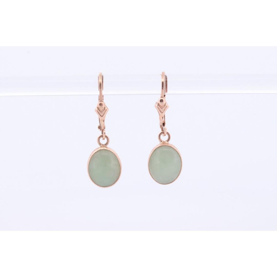 Vintage des années 1980
MATERIAL : Or
Pierre précieuse : Jade
Emplacement : Lobe d'oreille
Fermeture : Poussée vers l'arrière

Style : Minimaliste


Magnifiques boucles d'oreilles ovales en Jade vert pomme. Or jaune 14k.

Détails :
2,4