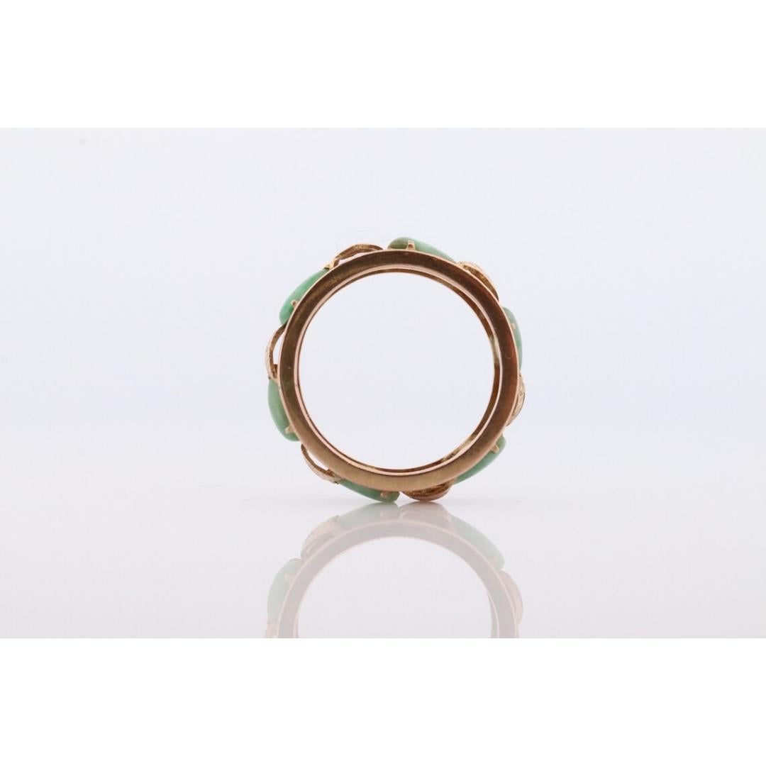 Vintage from the 1990s
Size: 7 1/4 US
Materials: Stone
Gemstone: Jade
Gem color: Green

Style: Minimalist

Wonderful Apple Green Jade Cabochon ring. Jade is translucent green and white color. Prong set into open leaf eternity band.


3.5grams total