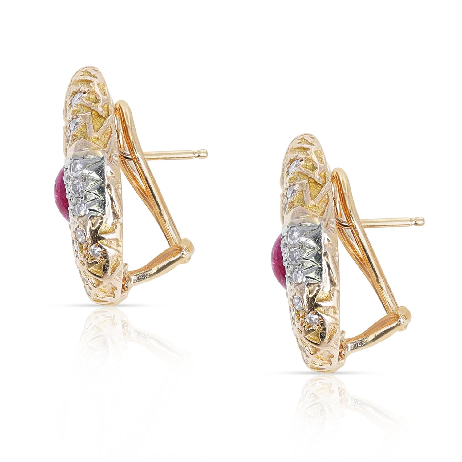 A stylish pair of Hammered Gold Ruby Cabochon and Diamond Earrings made in 14K Gold. The weight of the earrings is 16.98 grams. The length is 0.90