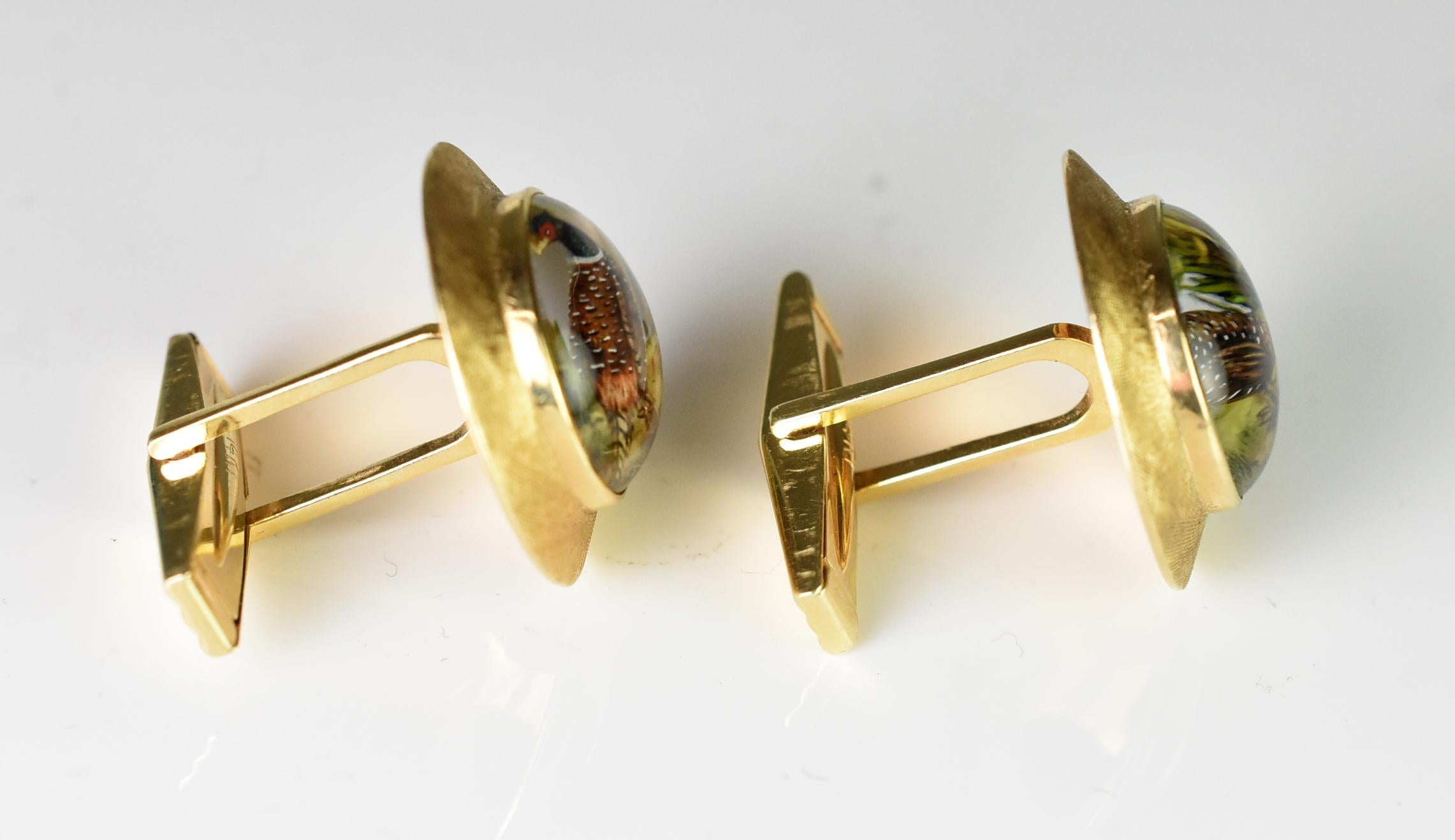 Scully & Scully 14k hand painted rock crystal pheasant cufflinks. Signed by artist on lower edge. Hallmarked 14k and an unidentified symbol. The signature is the same artist as found on Deakin & Francis and Scully & Scully cufflinks. 7/8