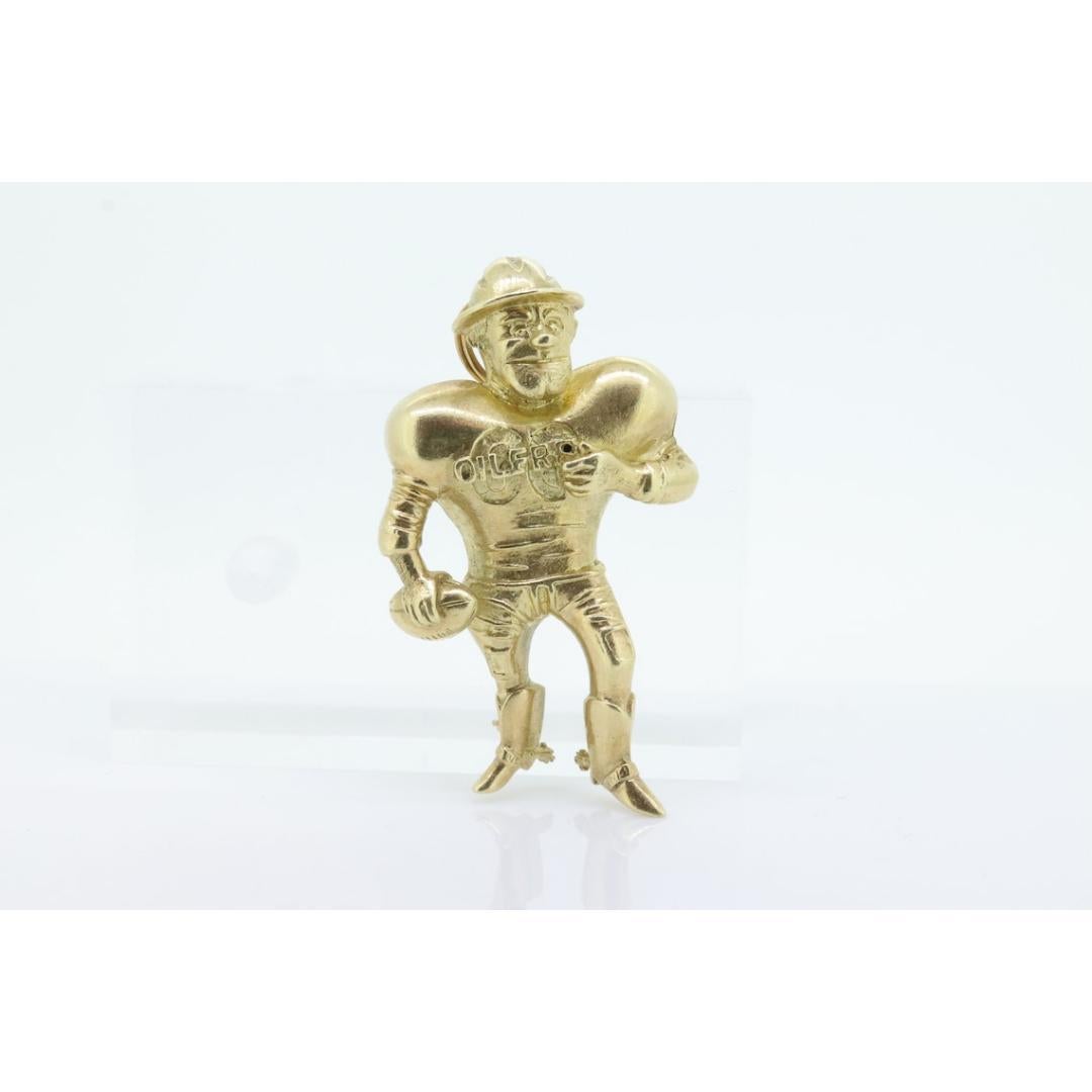 Vintage from the 1920s
Materials: Stone

Style: Brutalist

This is one of a kind and possibly only one available.

This is a Houston Oilers Roughneck Mascot pendant / brooch.

It belonged to Larry Onesti.

Engraved 9-24-1964

Details:
11grams 14k