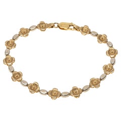 Bracelet à maillons en or jaune et blanc 14 carats avec fleurs brossées et polies