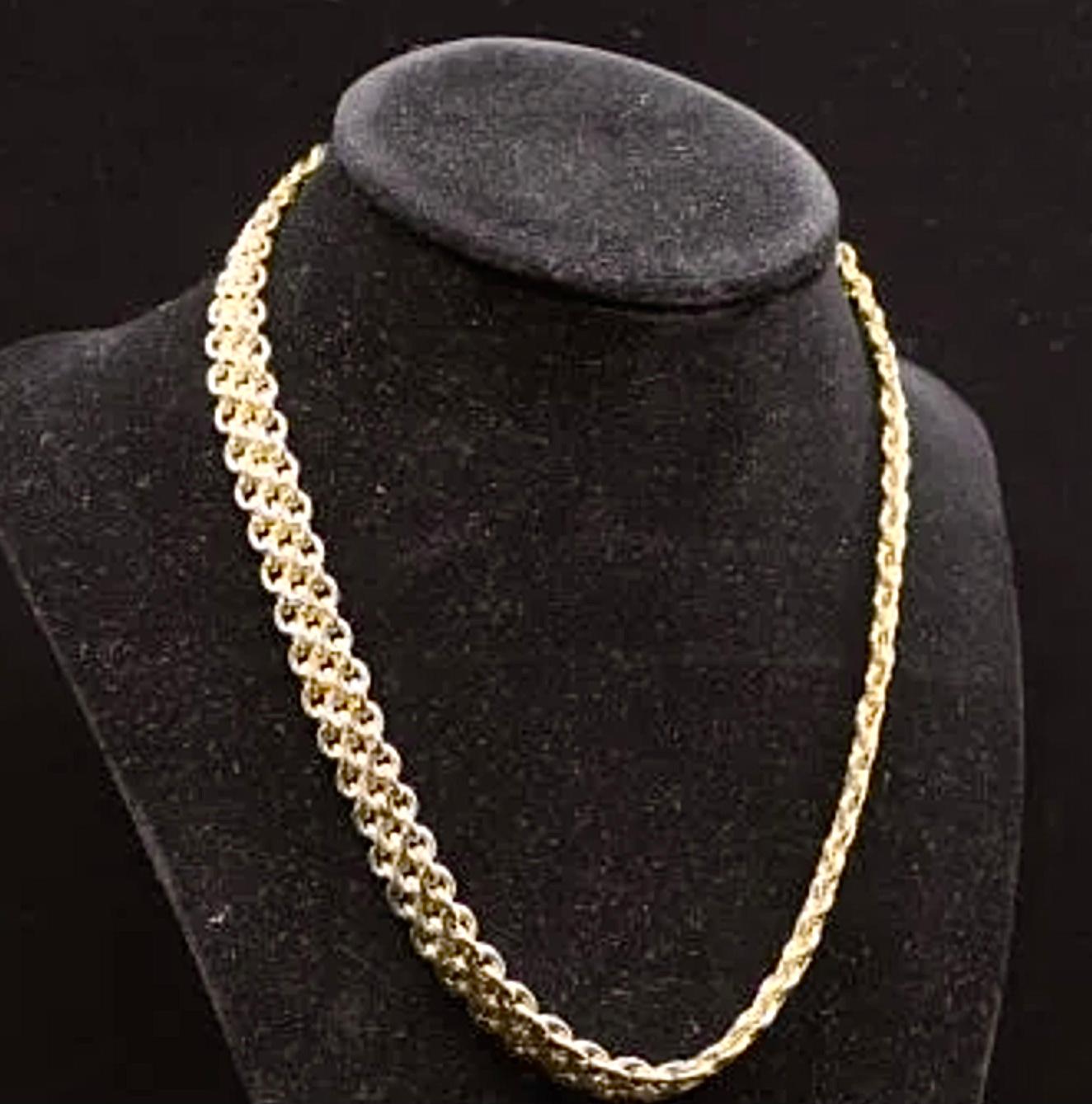 Beautiful, heavy 14k Italian gold link chain wide mesh necklace. The necklace measures 17 inches. It is marked 14k Italy and it weighs 30.8 Grams. Any darkness in the necklace is due to camera reflection. This beautiful necklace is offered here in