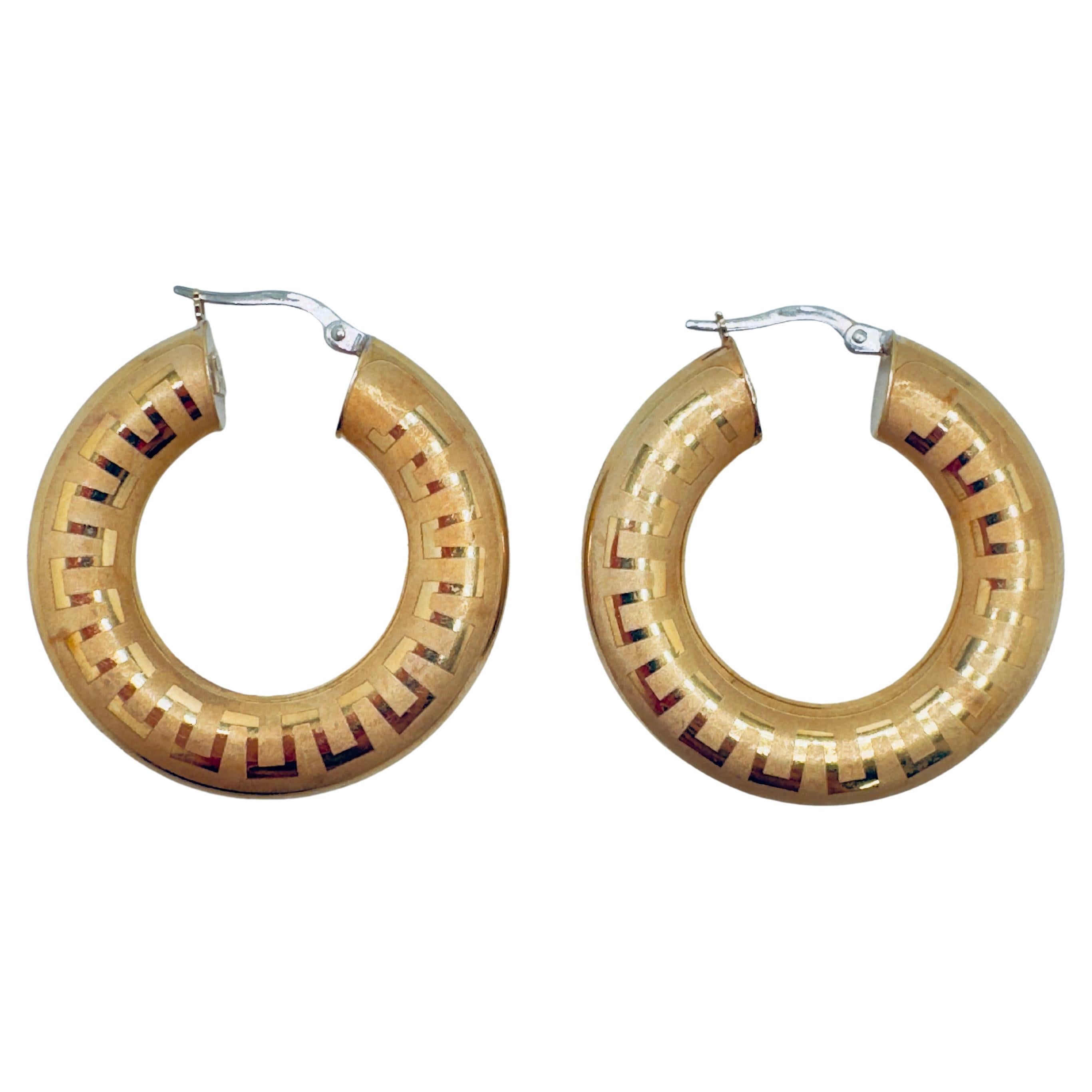 Boucles d
oreilles italiennes 14K avec clé grecque