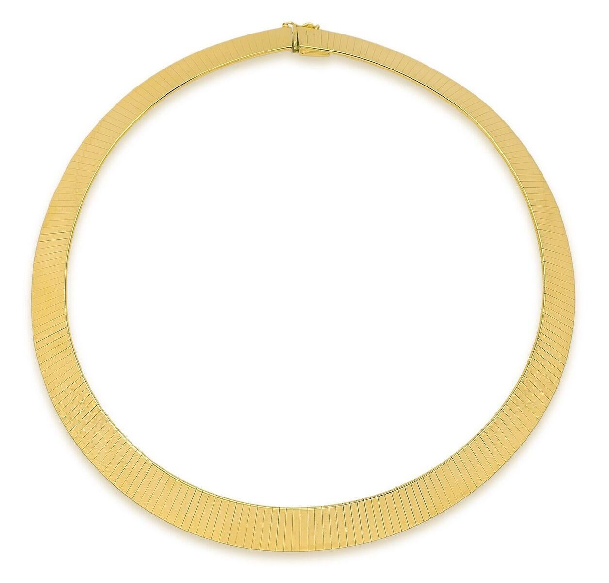 A magnificent choice made in Italy, this 14K Italian Yellow Gold omega flat necklace is stylish and sophisticated. Ideal for an everyday look for the lady wanting a classic high polished piece. 
